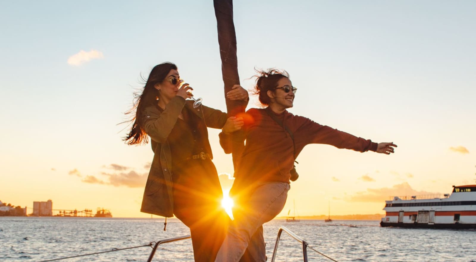 couple drinking on boat in lisbon