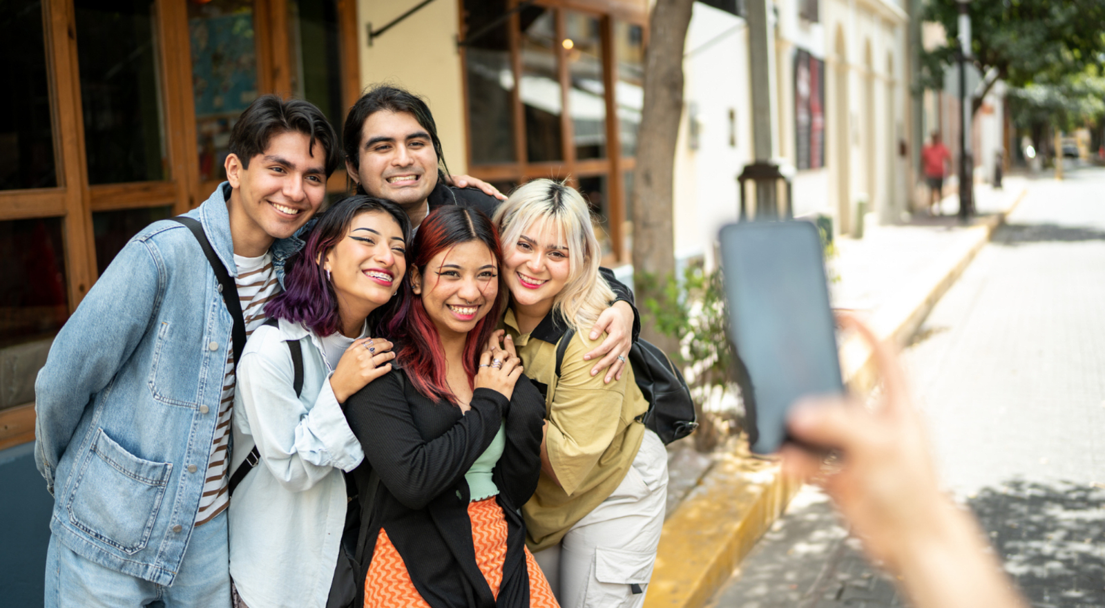 group of young traveller posing for photo