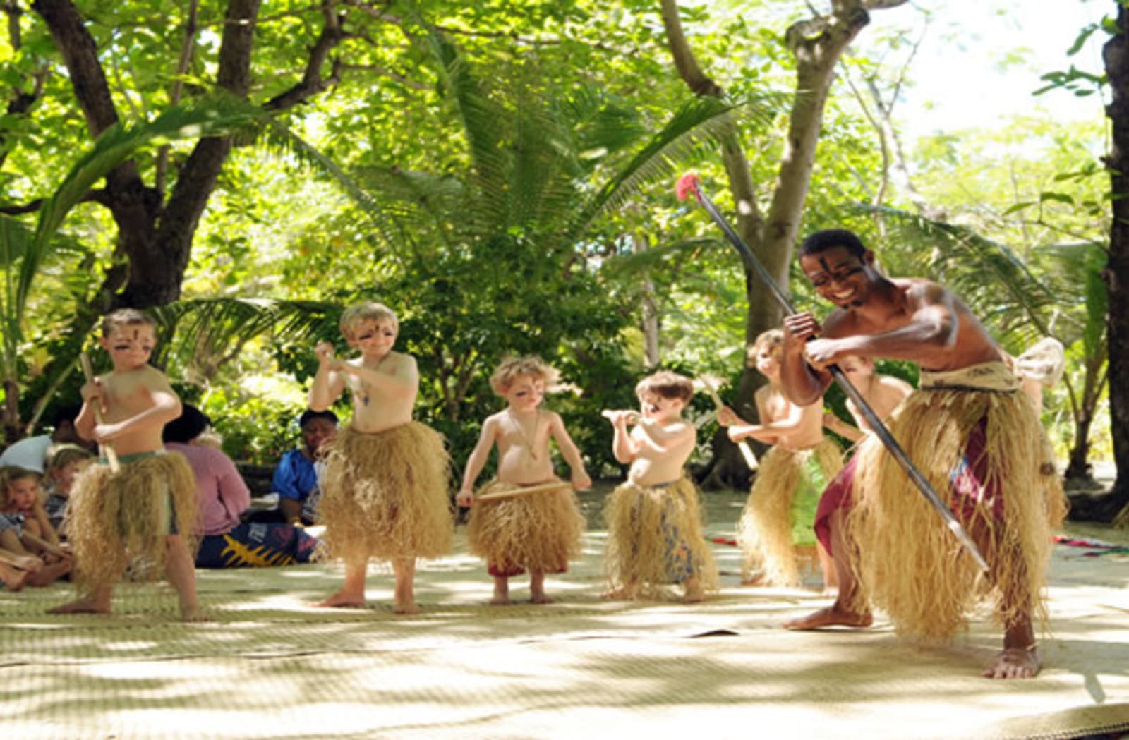 fiji local dancing with young tourists