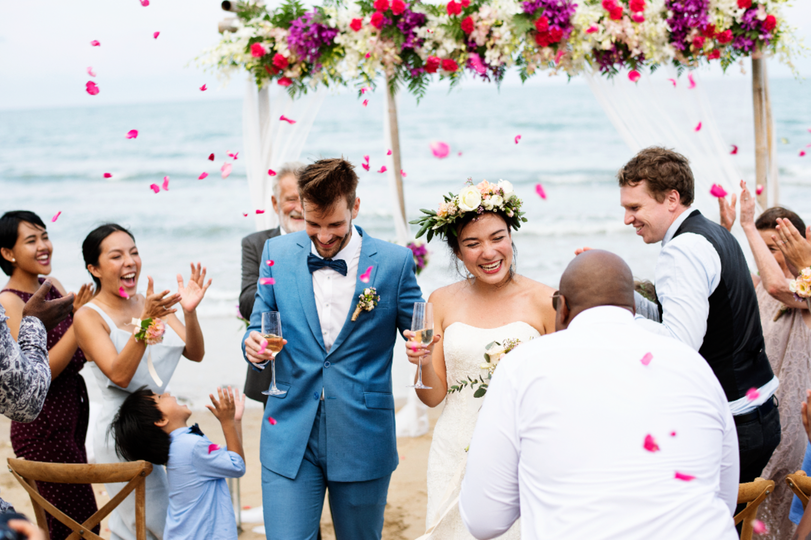 Bride and groom at beach wedding ceremony