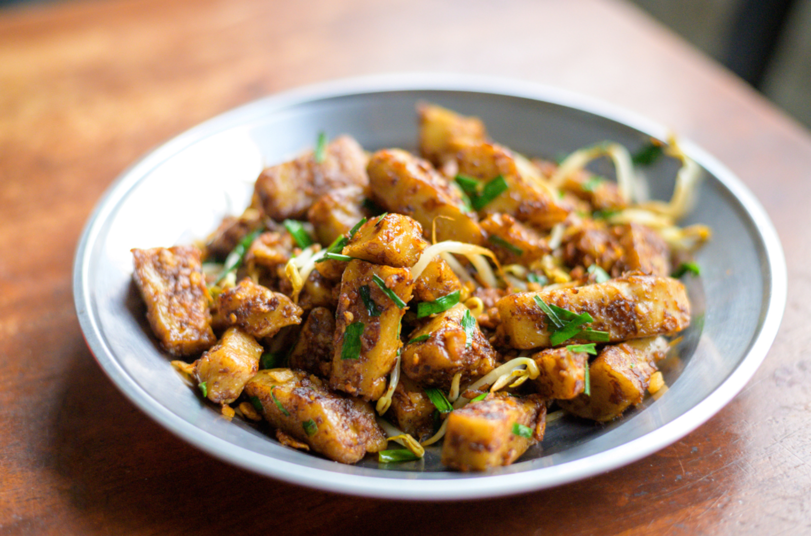 Plated dish of fried carrot cake.