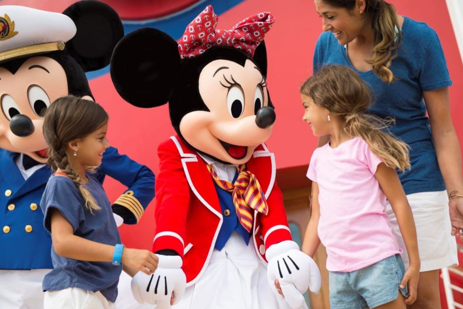Kids meeting Mickey and Minnie aboard a Disney Cruise Line ship