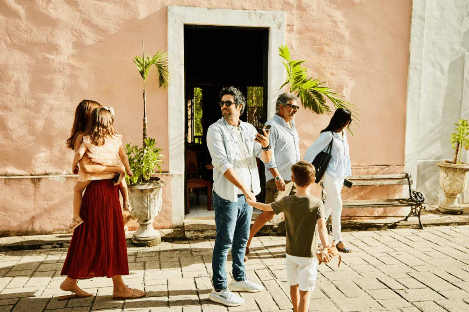 Family exploring a historic town in the Caribbean