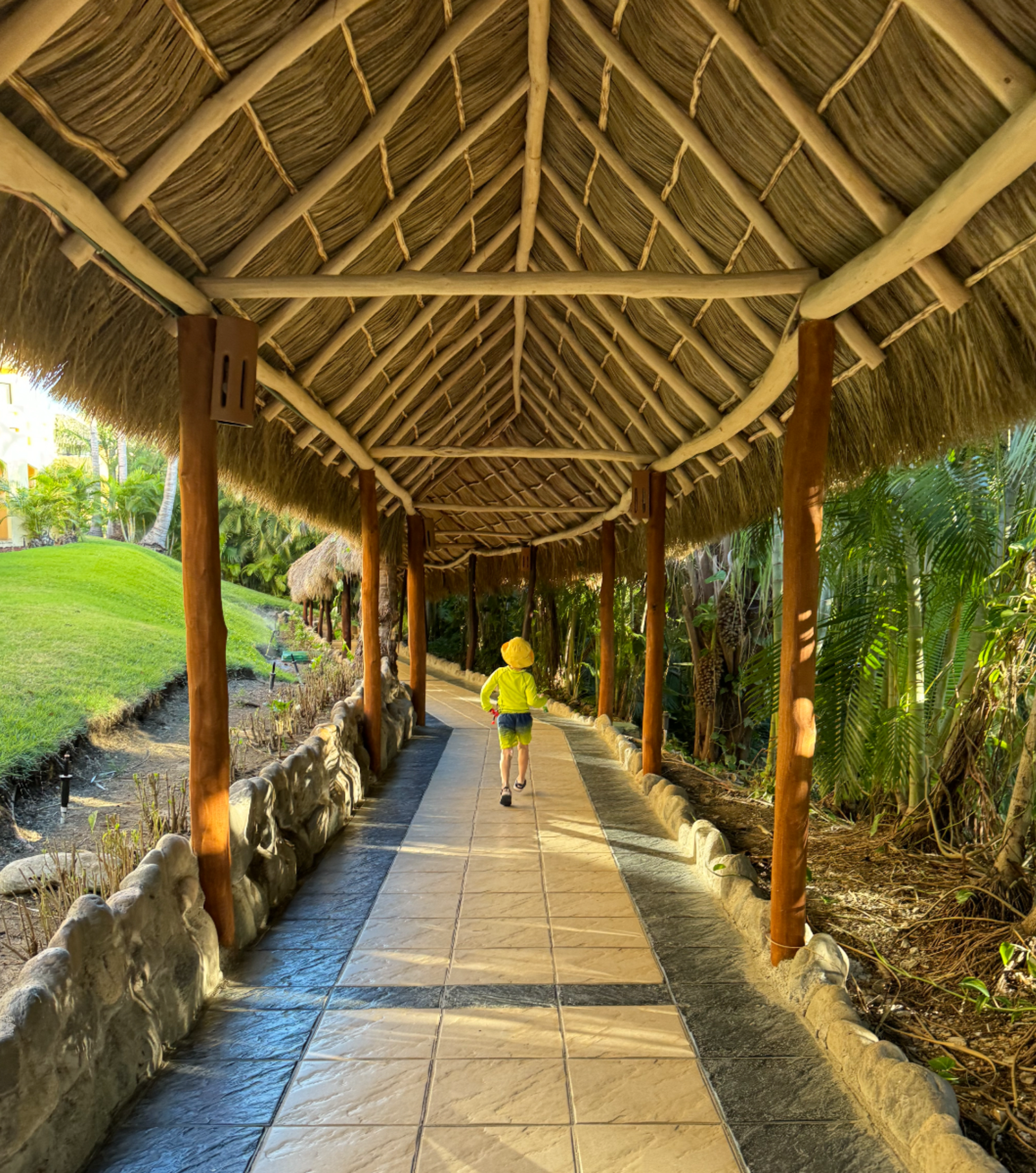 Child walking on the grounds of the Grand Palladium Vallarta Resort & Spa
