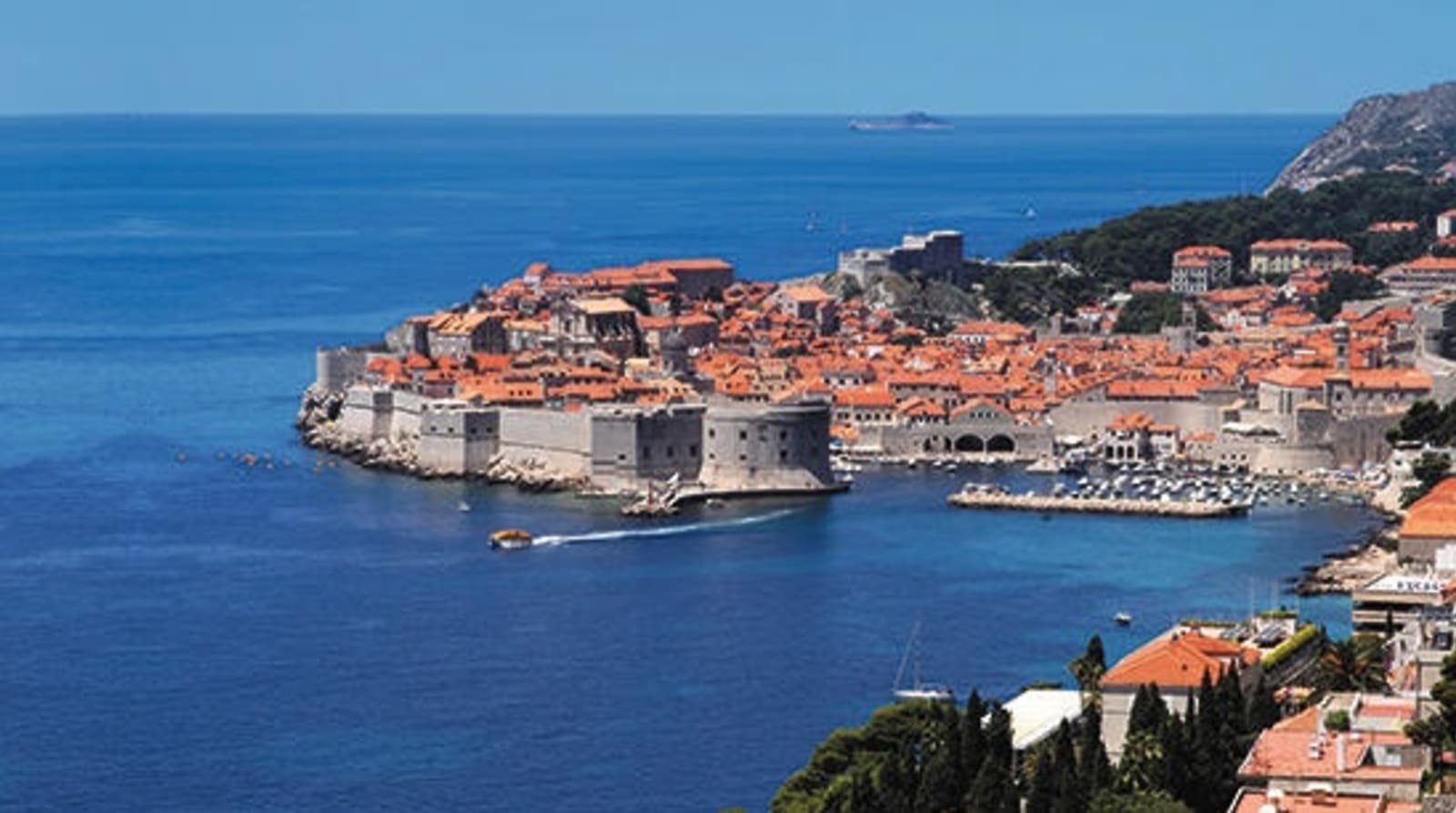 Image of Dubrovnik from a distance on the water.