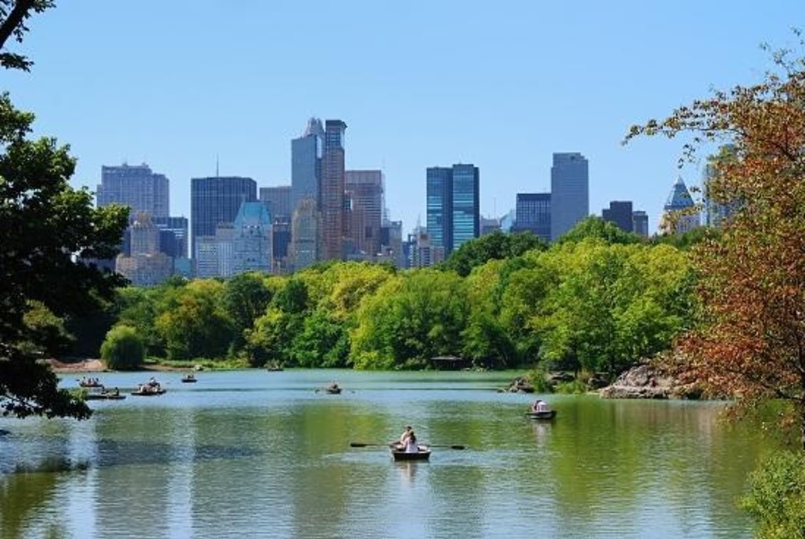 Couples paddling in the water at Central Park.