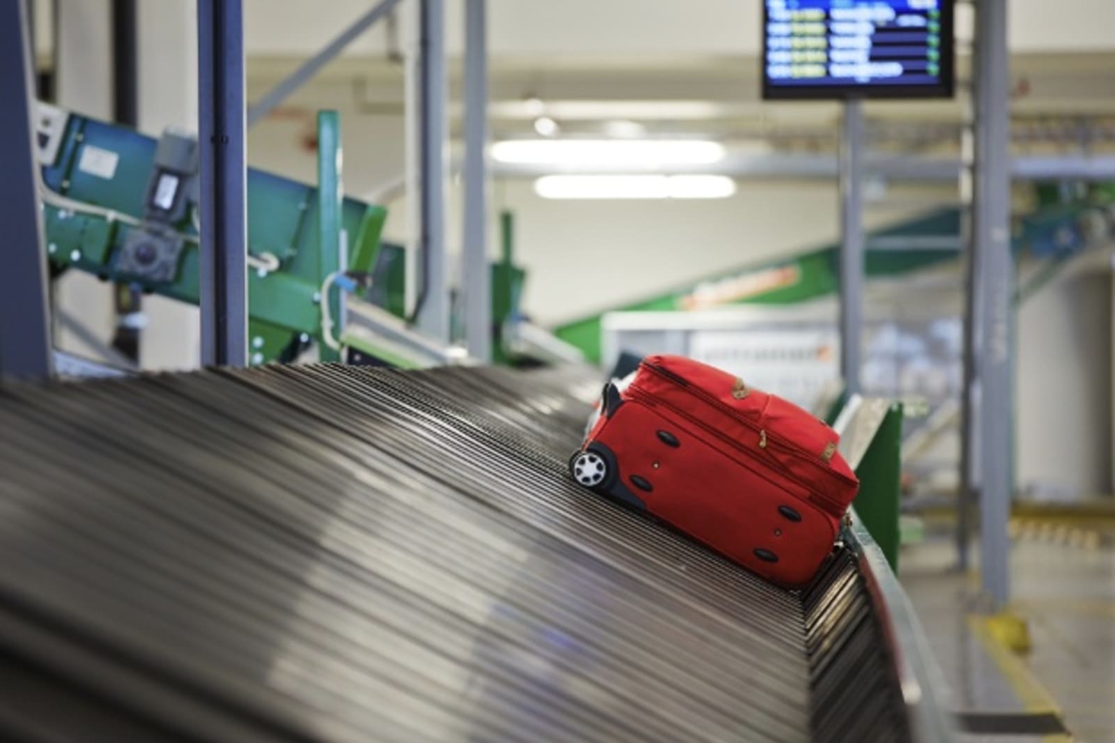 luggage sitting on luggage carousel