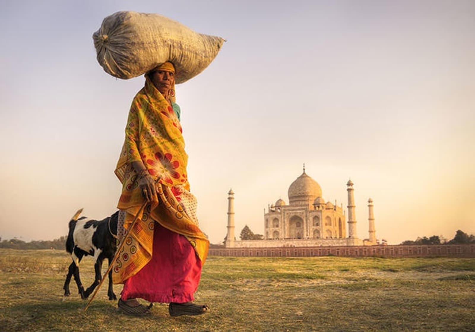 rs-woman-carrying-goods-taj-mahal-india-shutterstock_236744350.jpg