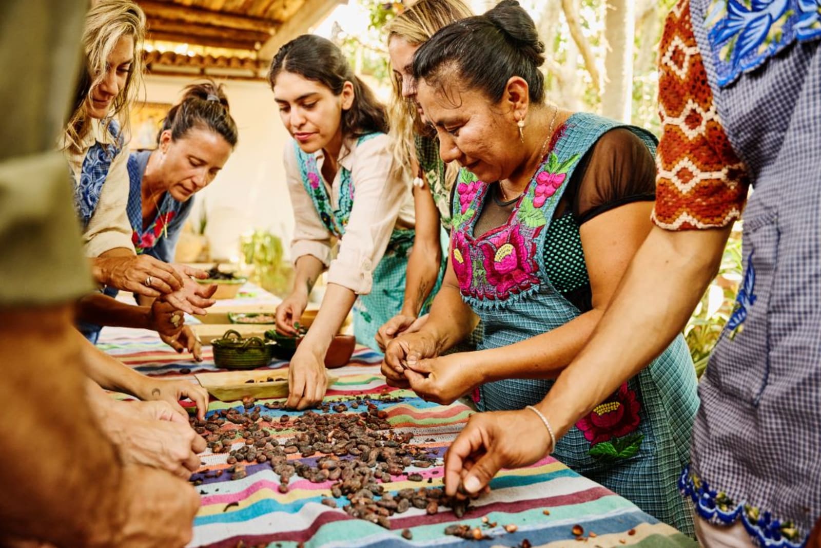Tour group at a traditional cooking class in Mexico