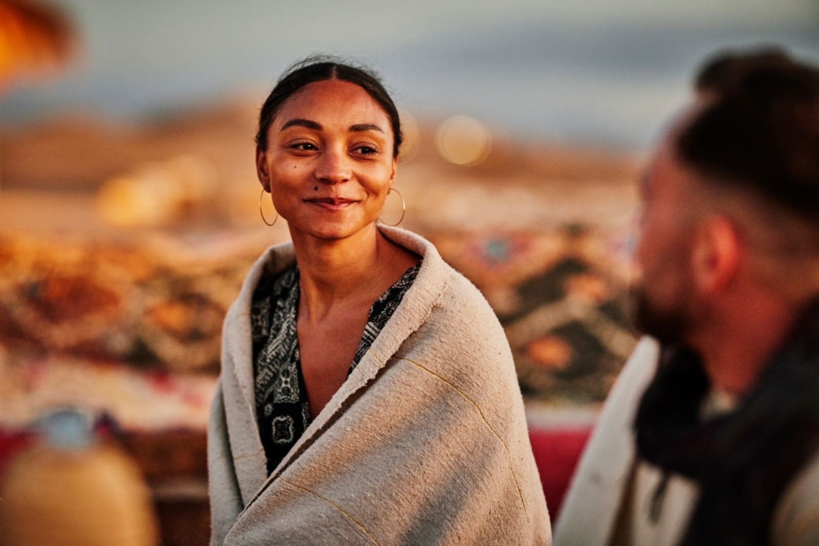Woman smiling in Morocco desert