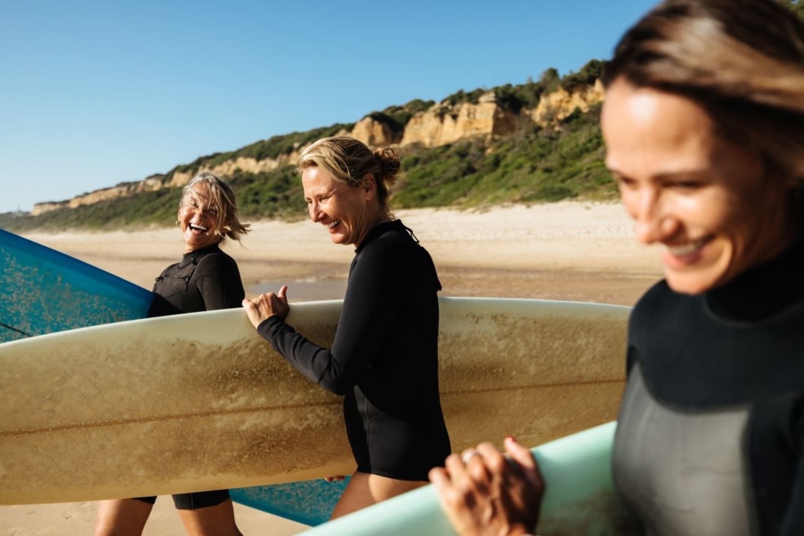 Group of women surfing