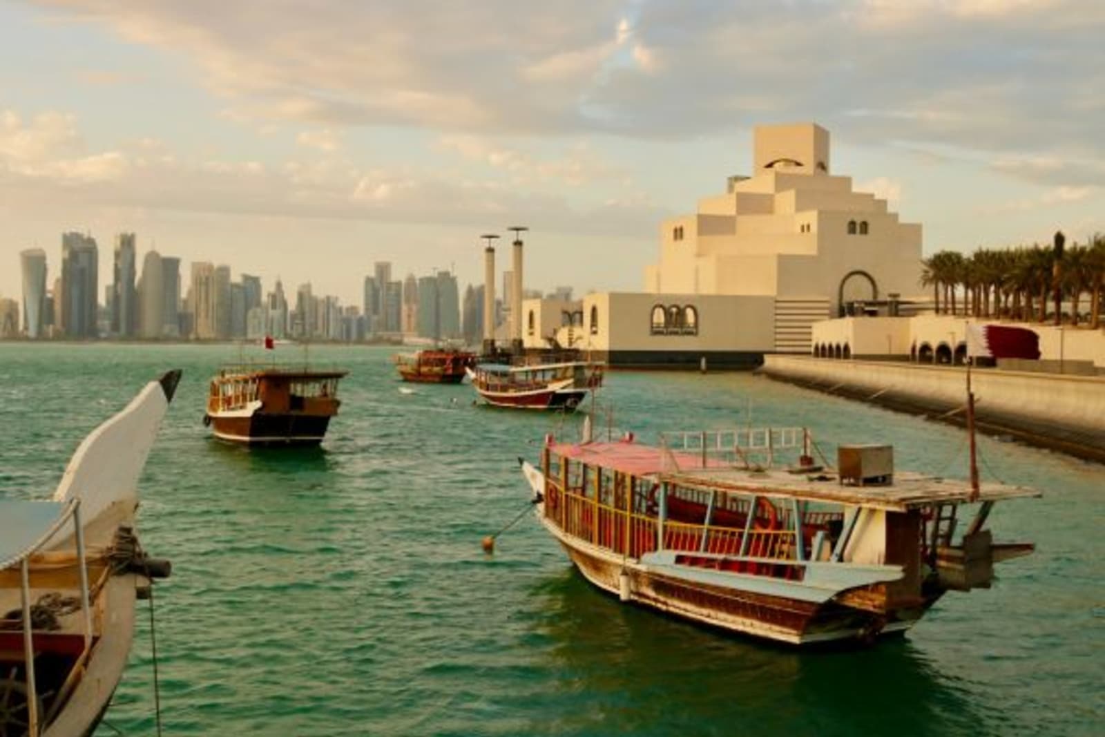 Dhows, harbour and modern cityscape of Doha