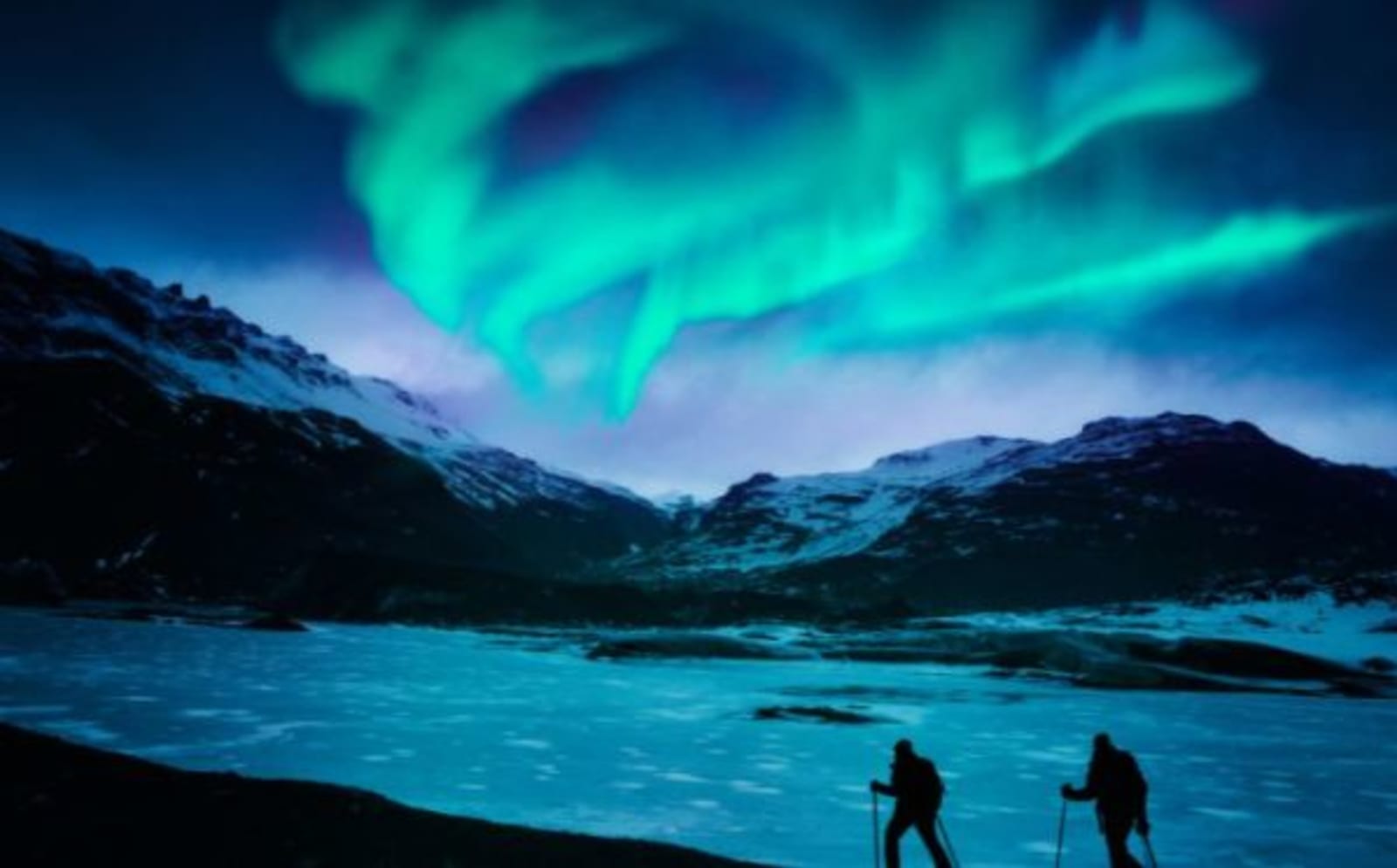 northern lights with hikers