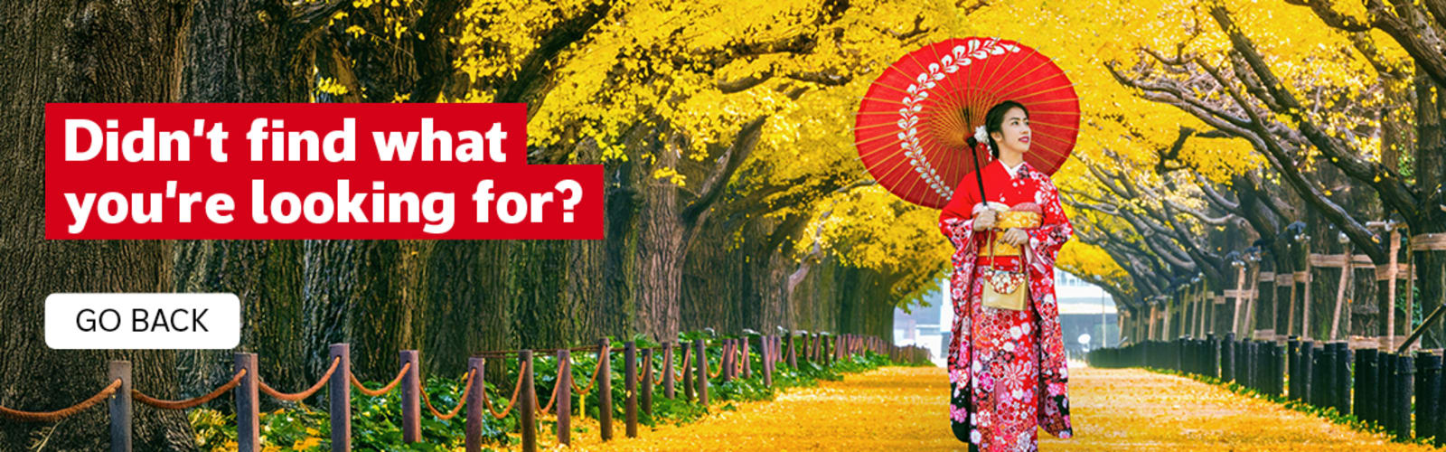 Didn't find what you're looking for? Go back. Woman in a red kimono walking through yellow Autumn leaves