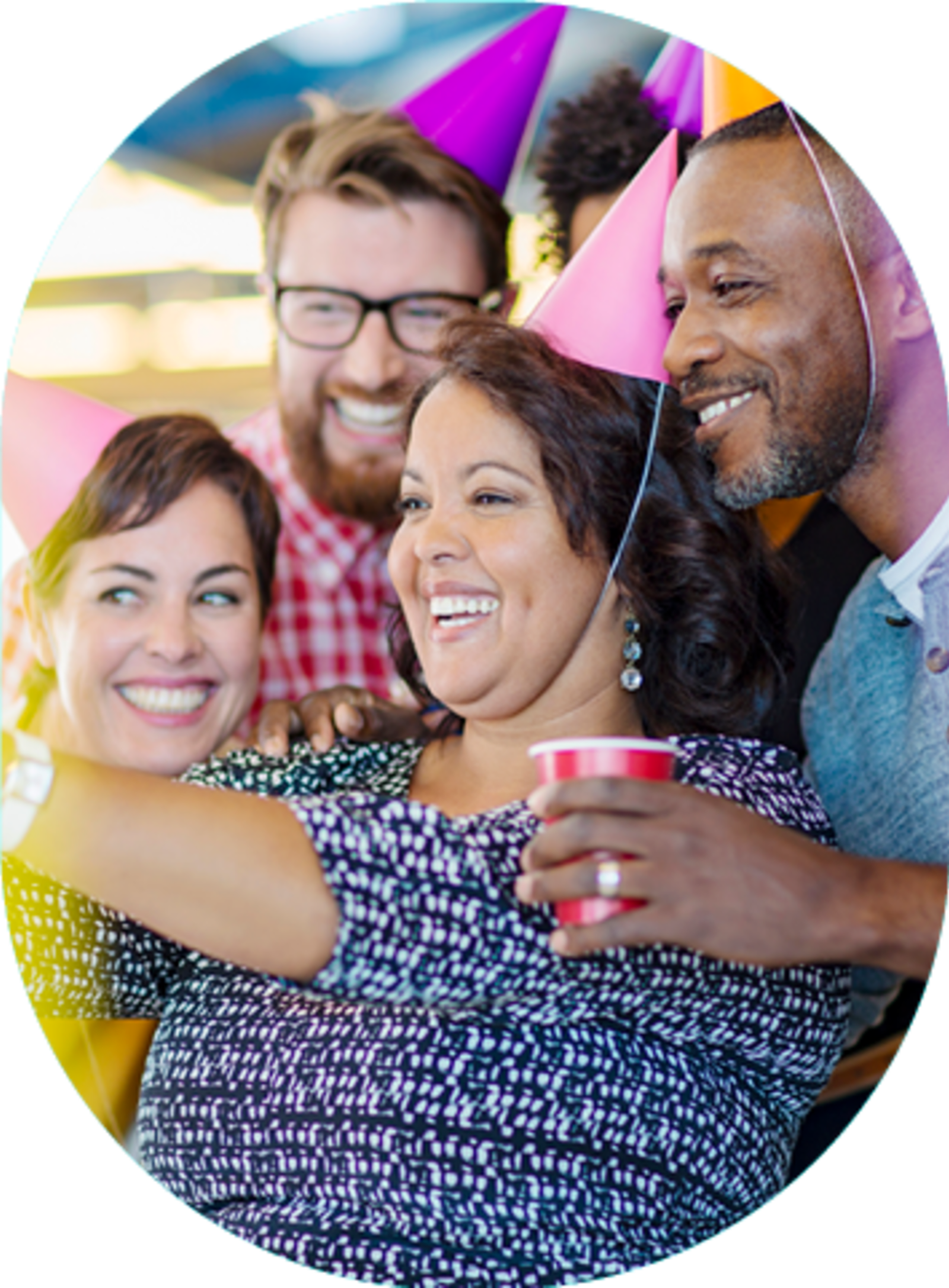 Corporate colleagues with party hats