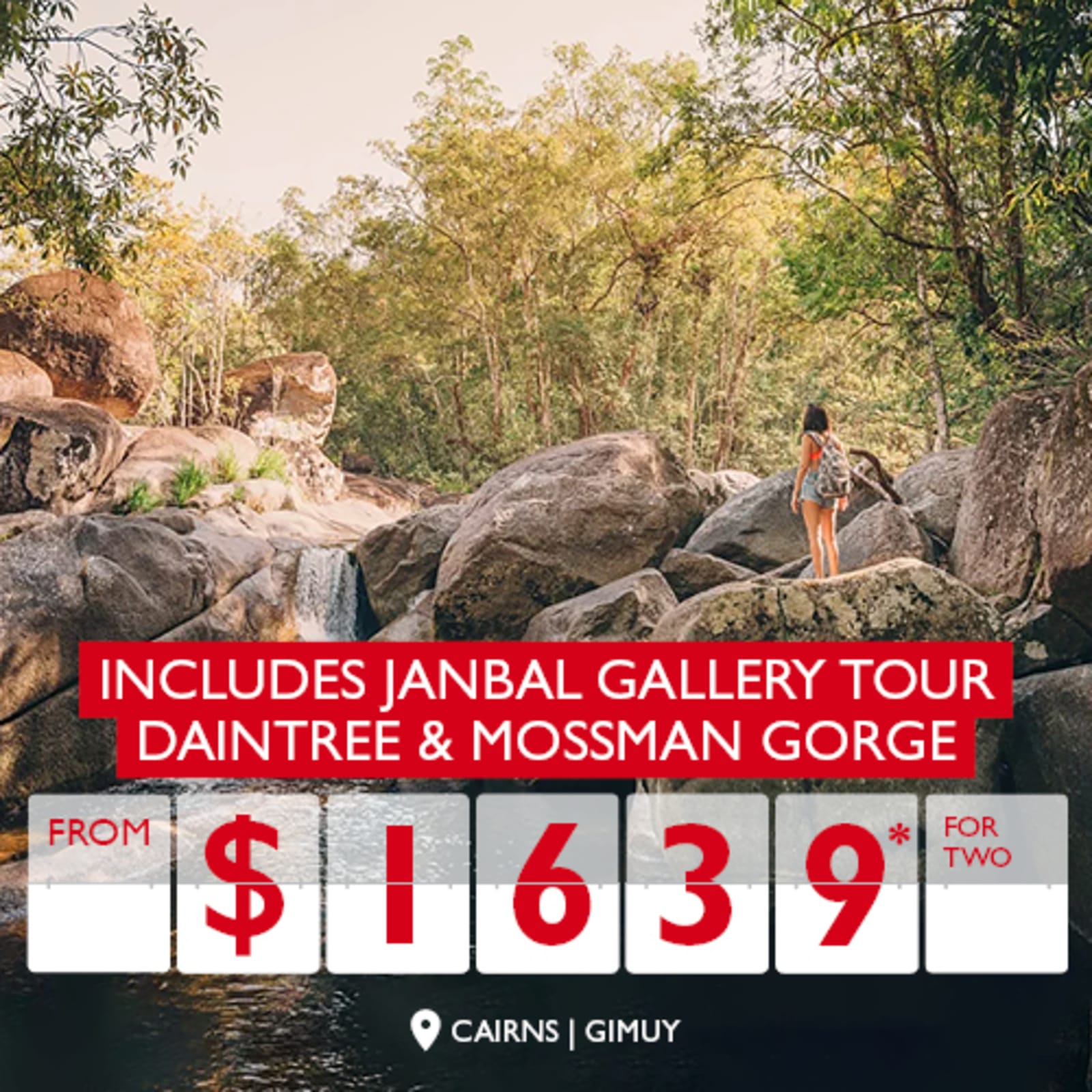 Includes Janbal gallery tour - Daintree & Mossman Gorge from $1,639* for two. Woman standing on smooth rocks in bushland