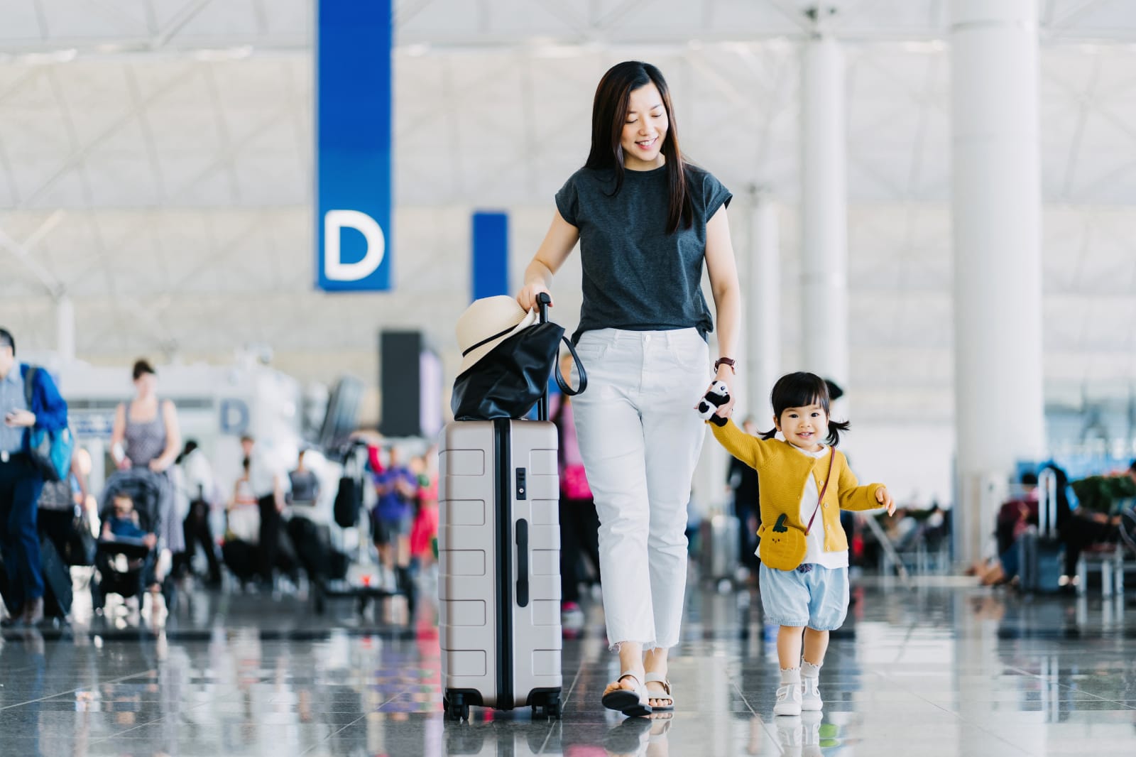 mother and kid at airport