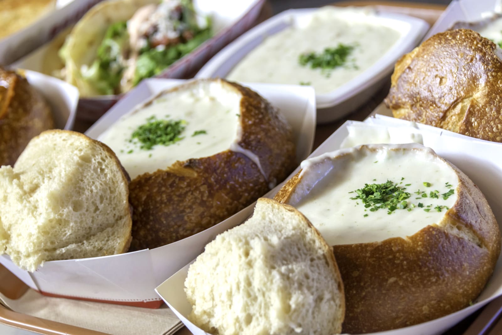 Clam chowder over a restaurant counter