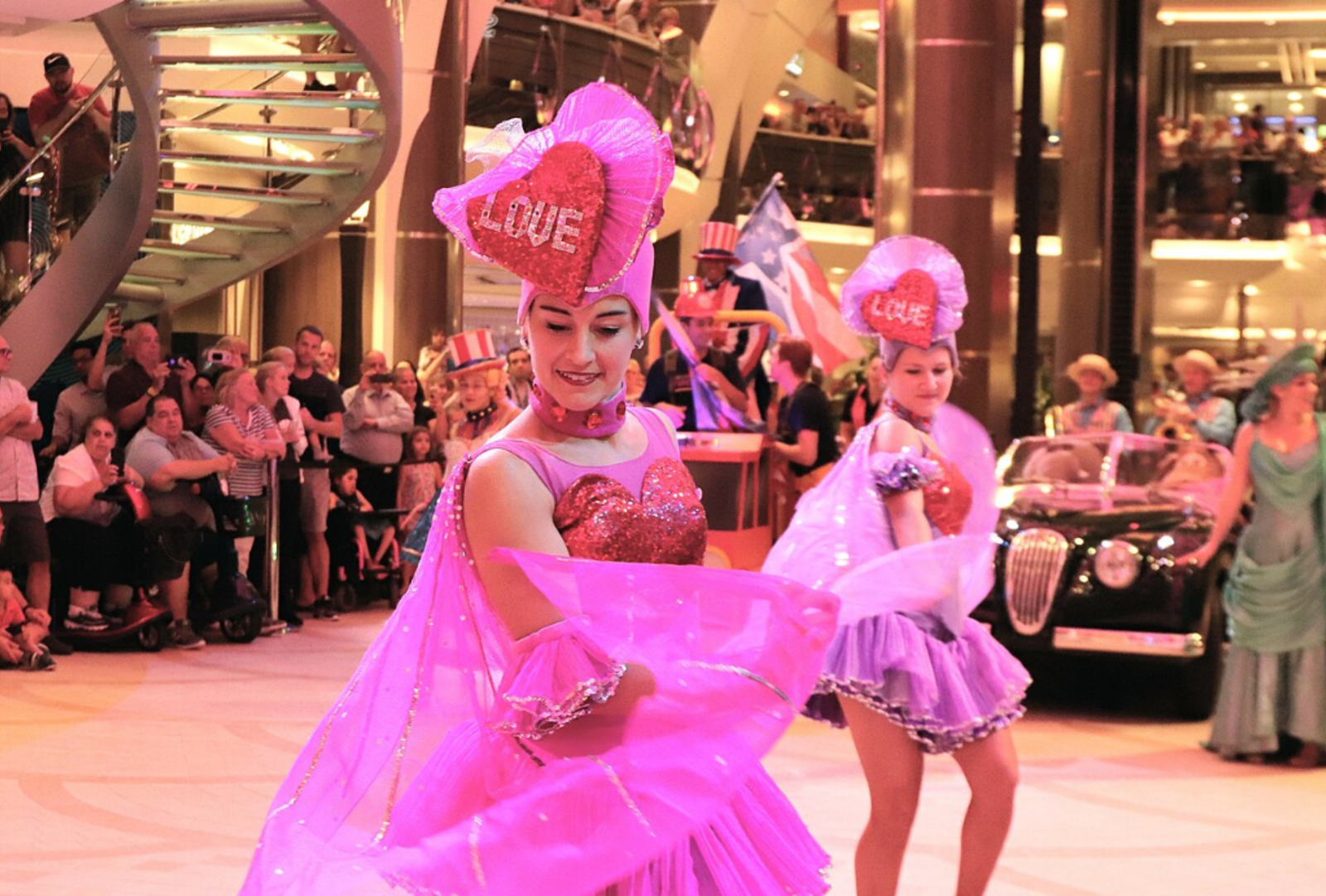 Dancers on a Harmony Parade aboard a cruise ship