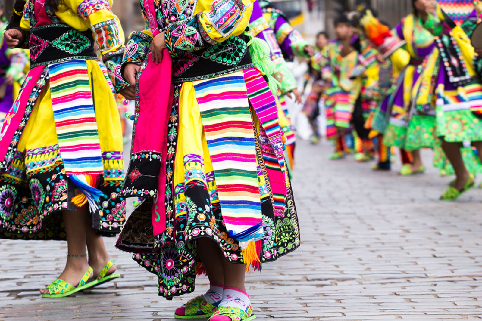 Peruvian dancers in traditional clothing during the Inti Raymi festival