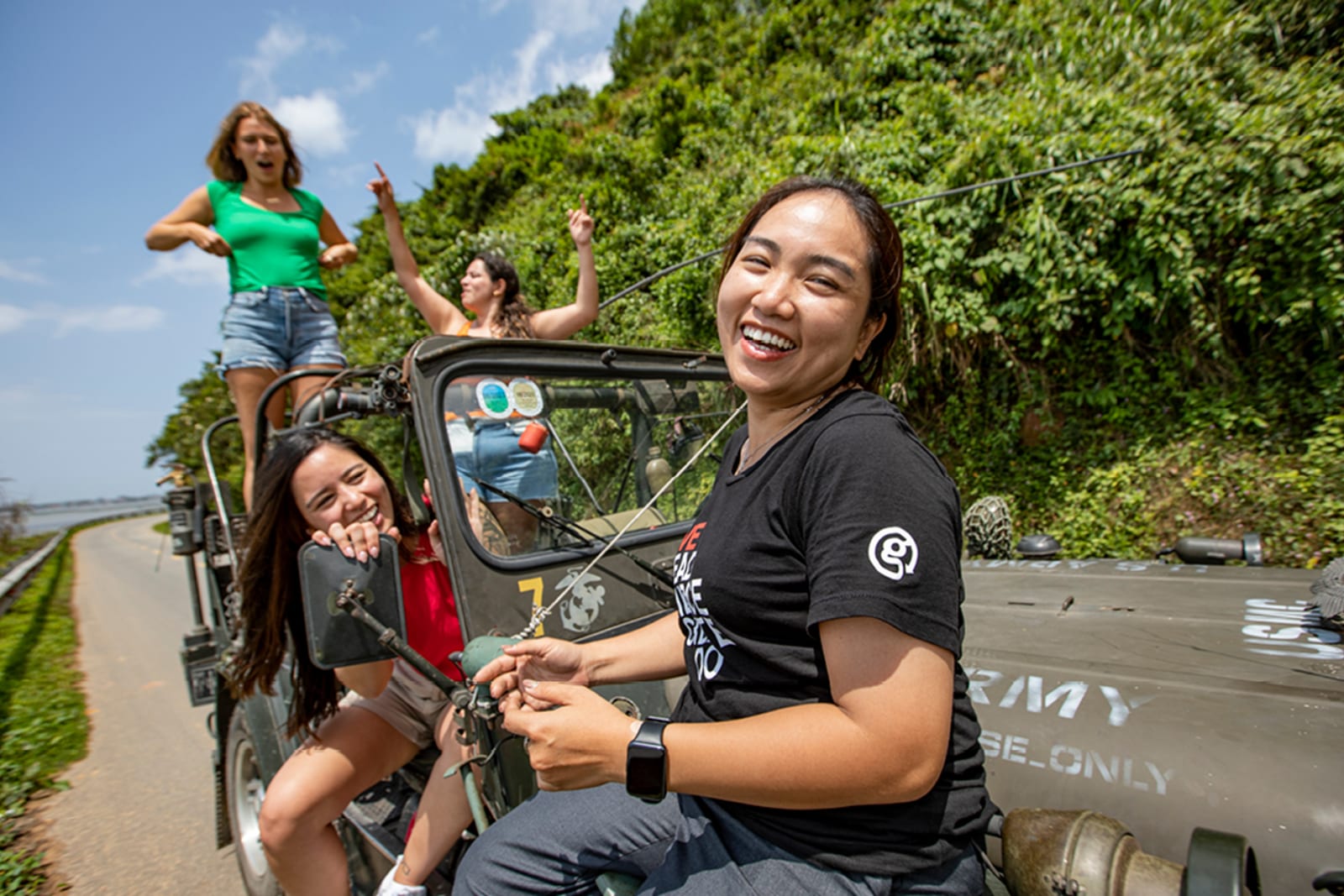 A group of women in a jeep on a G Adventures tour
