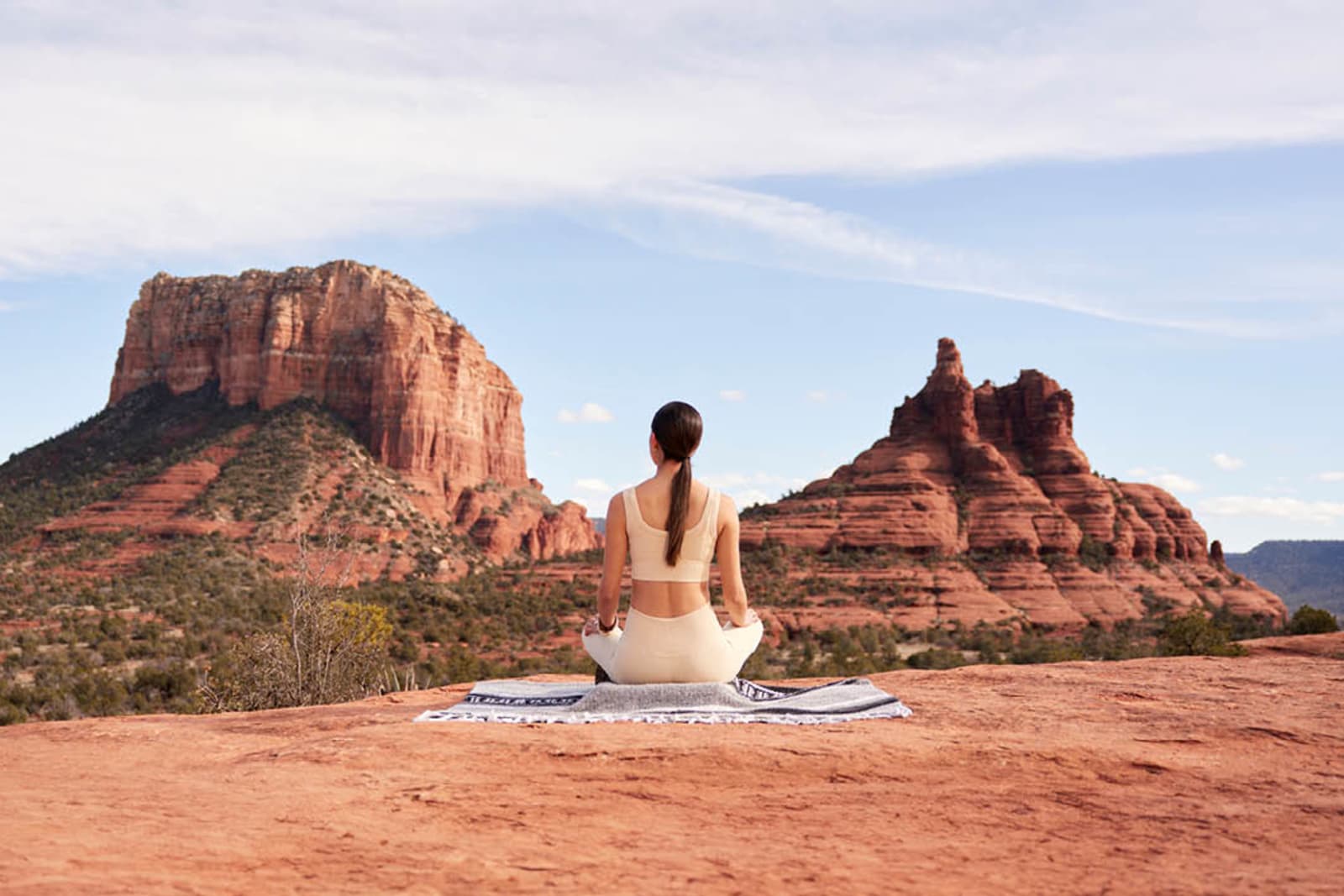 A woman doing yoga in the desert of Phoenix Valley