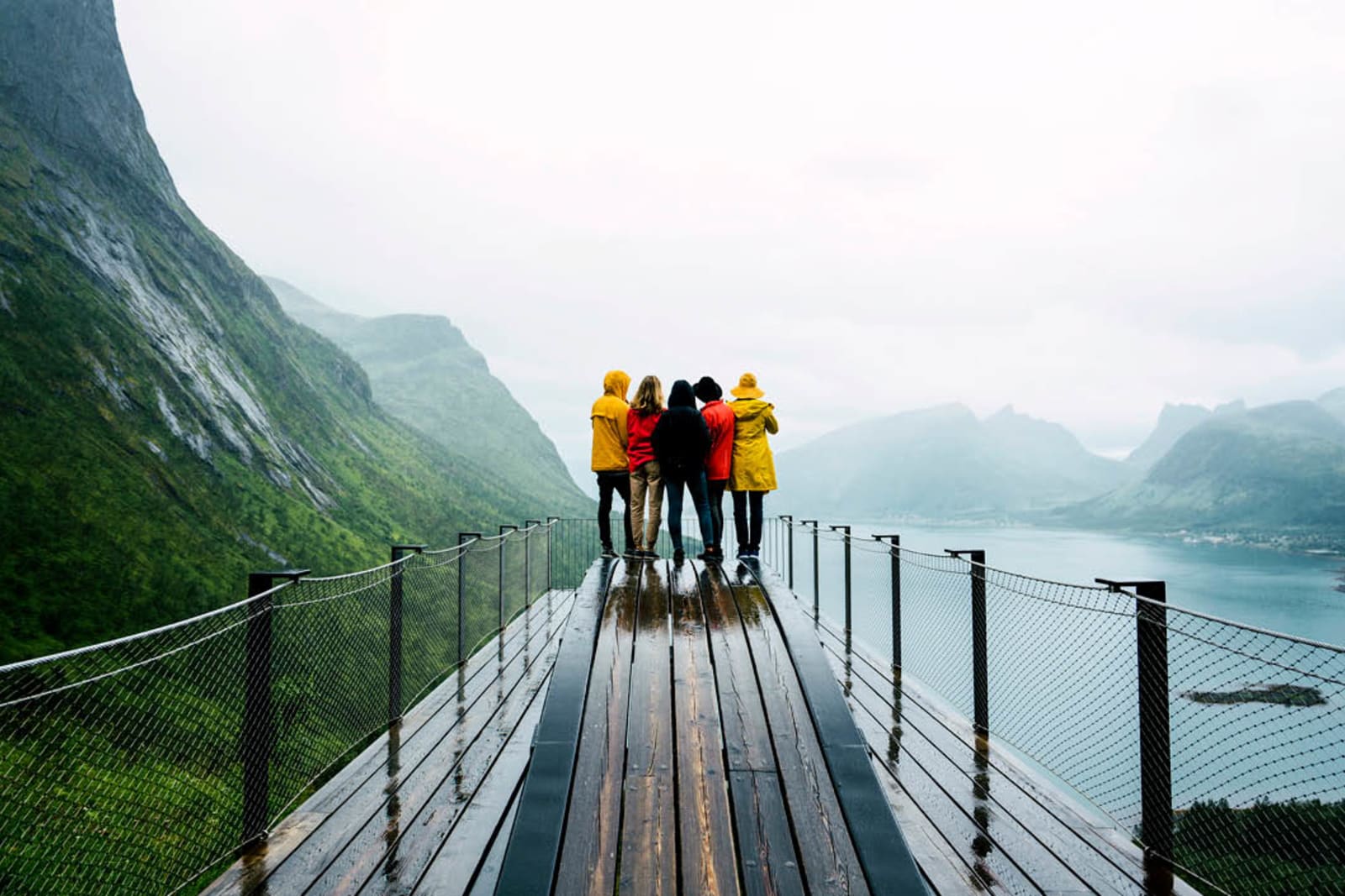 Friends on a group trip at viewpoint of hiking travel