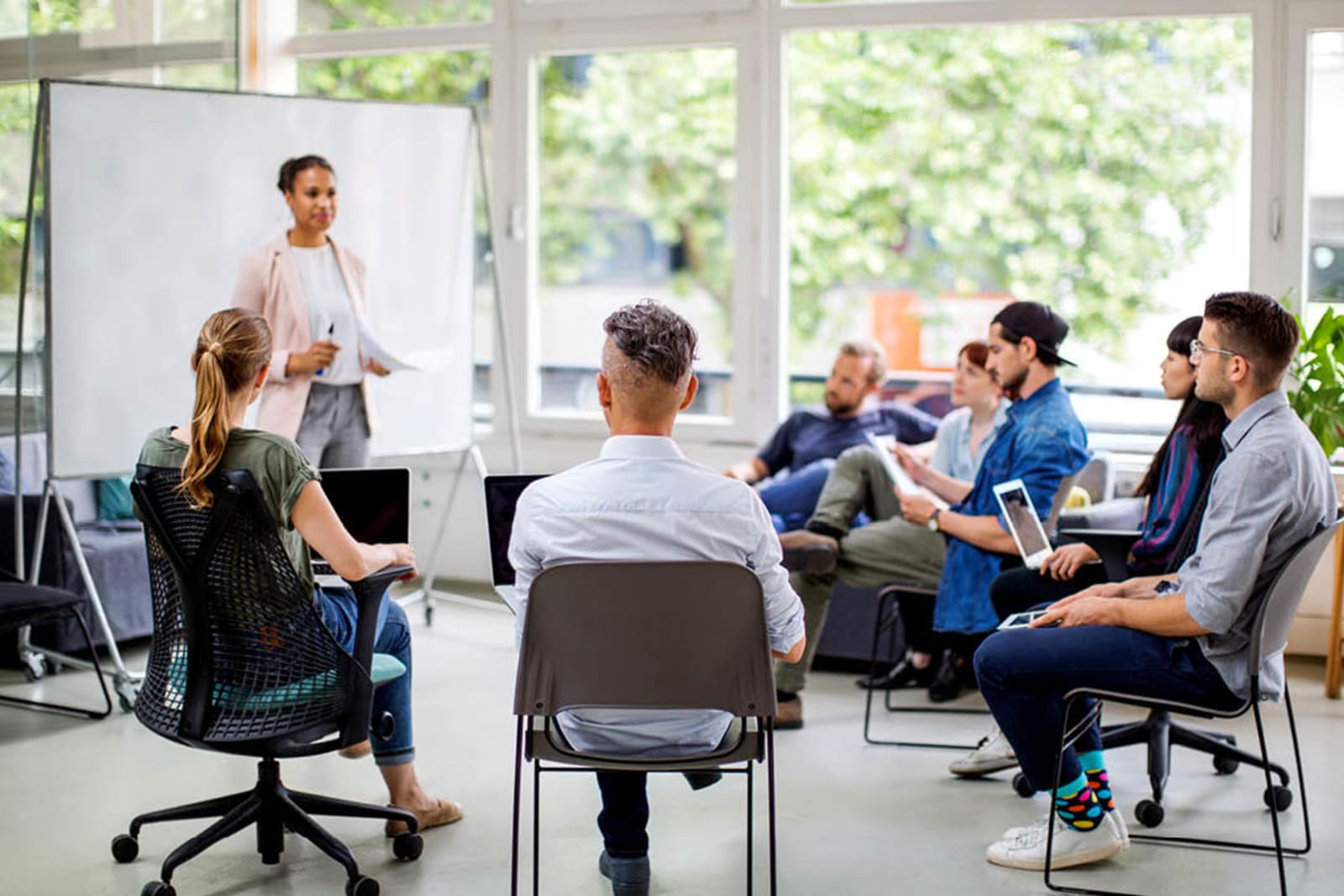 Small group of adult students in a language class