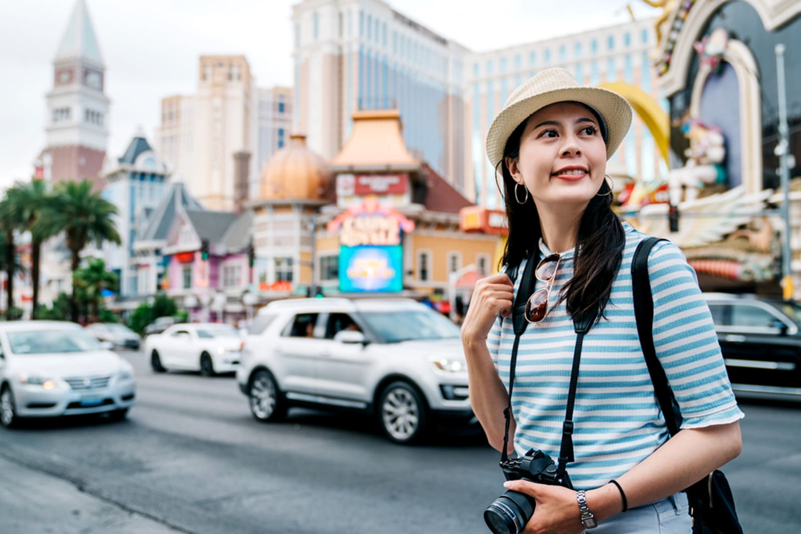A tourist walking on the Las Vegas Strip; they're wearing comfortable clothing