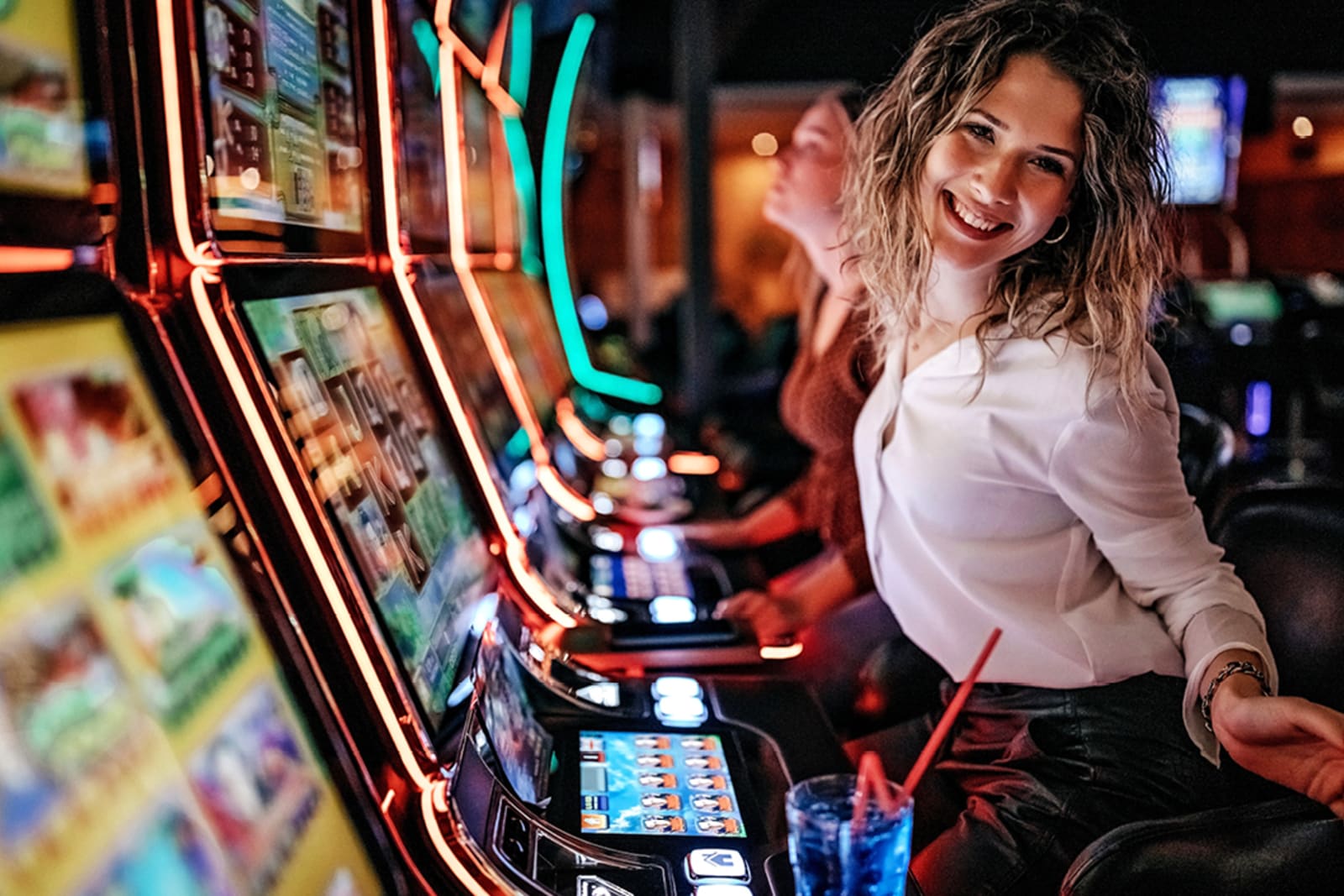 A woman gambling at a slow machine in a Las Vegas casino