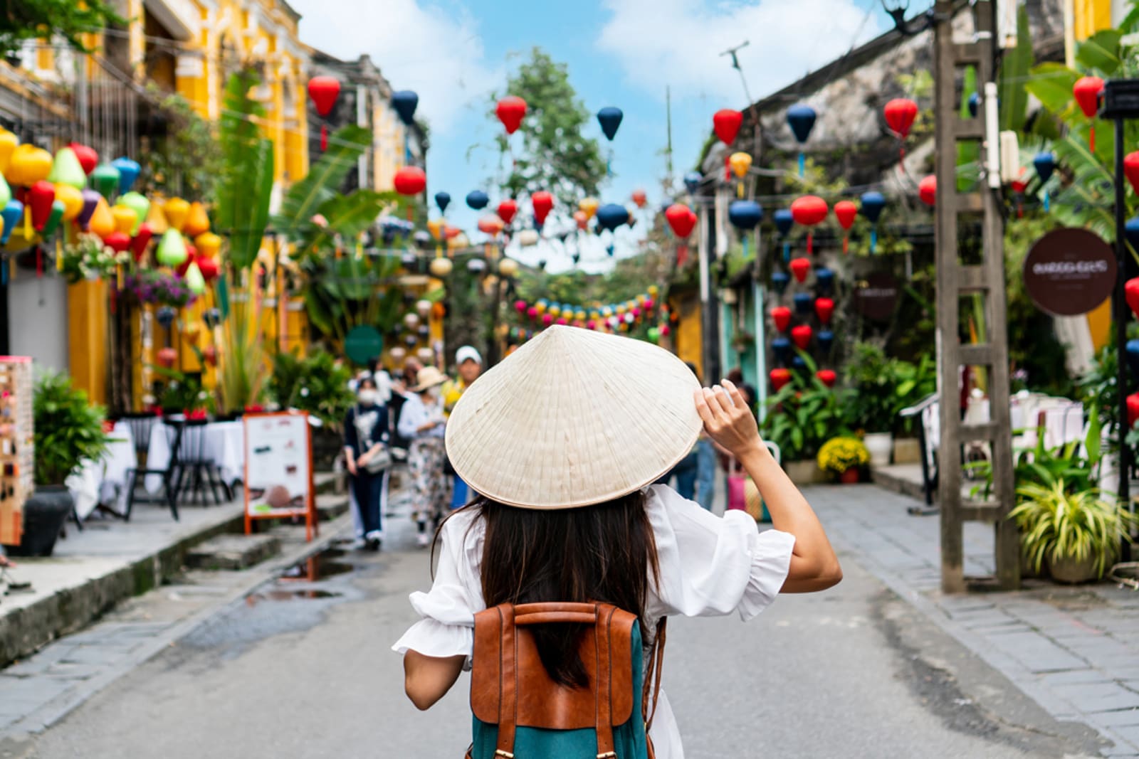 Woman exploring a city in Vietnam