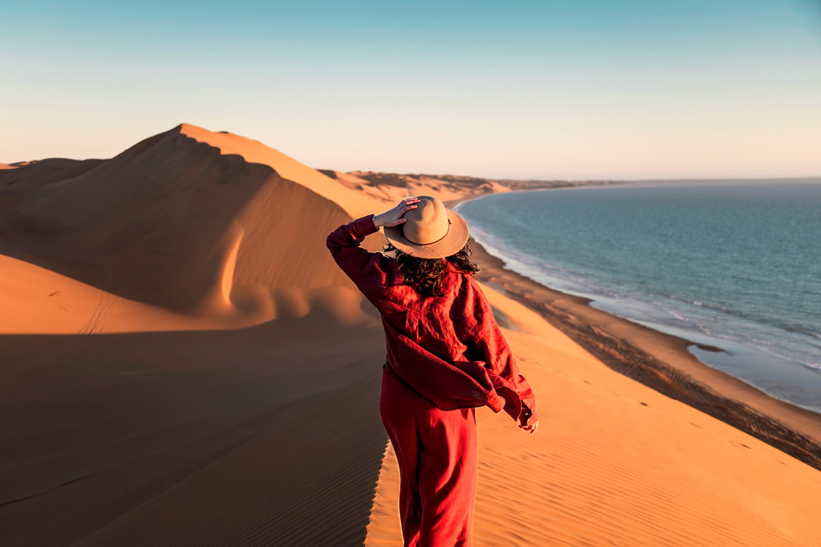 Traveller exploring sand dunes