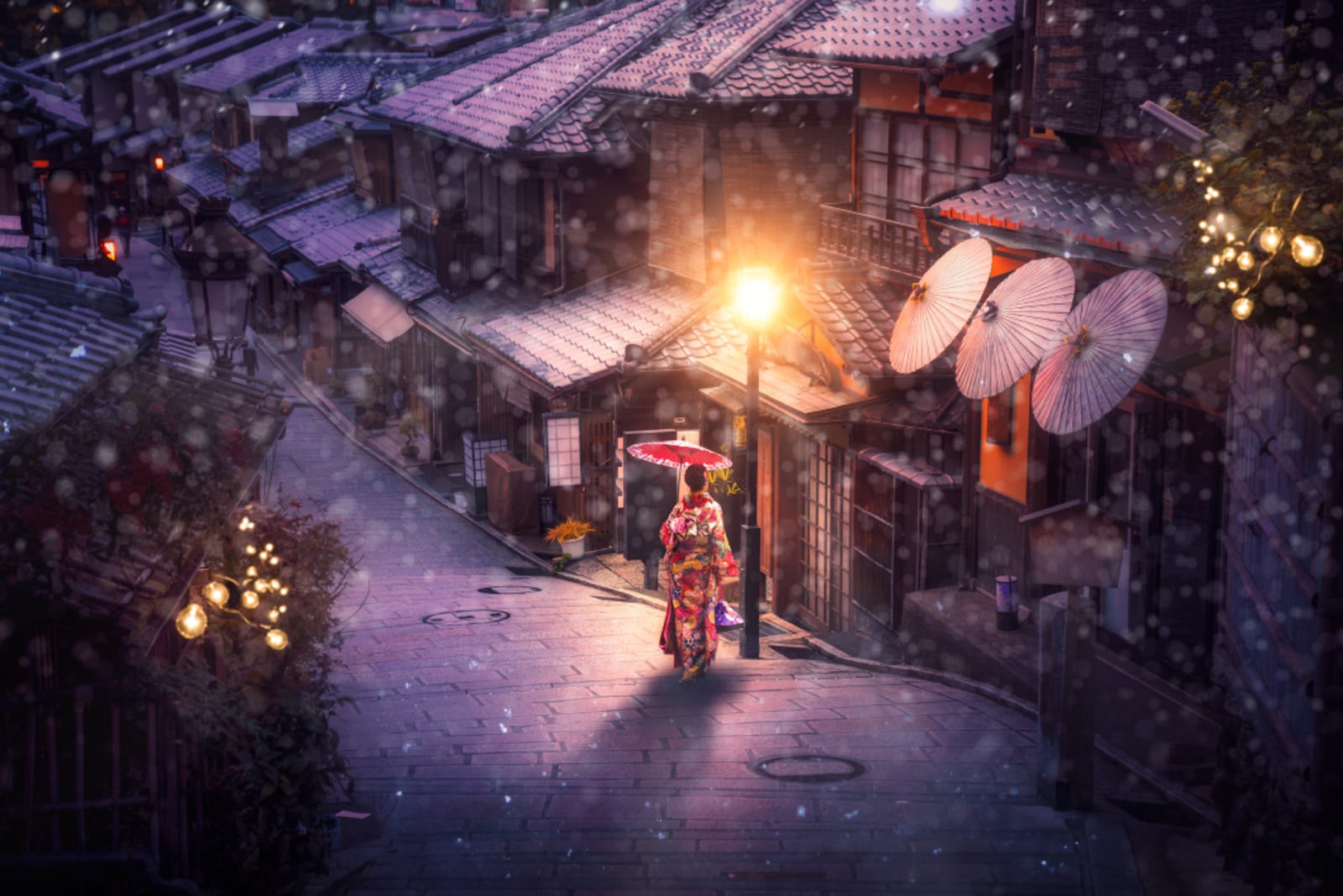 Japanese woman in snowy streets of Kyoto in Japan