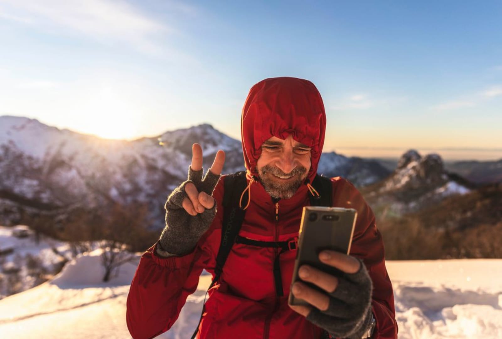 Image of a person using video chat on their phone