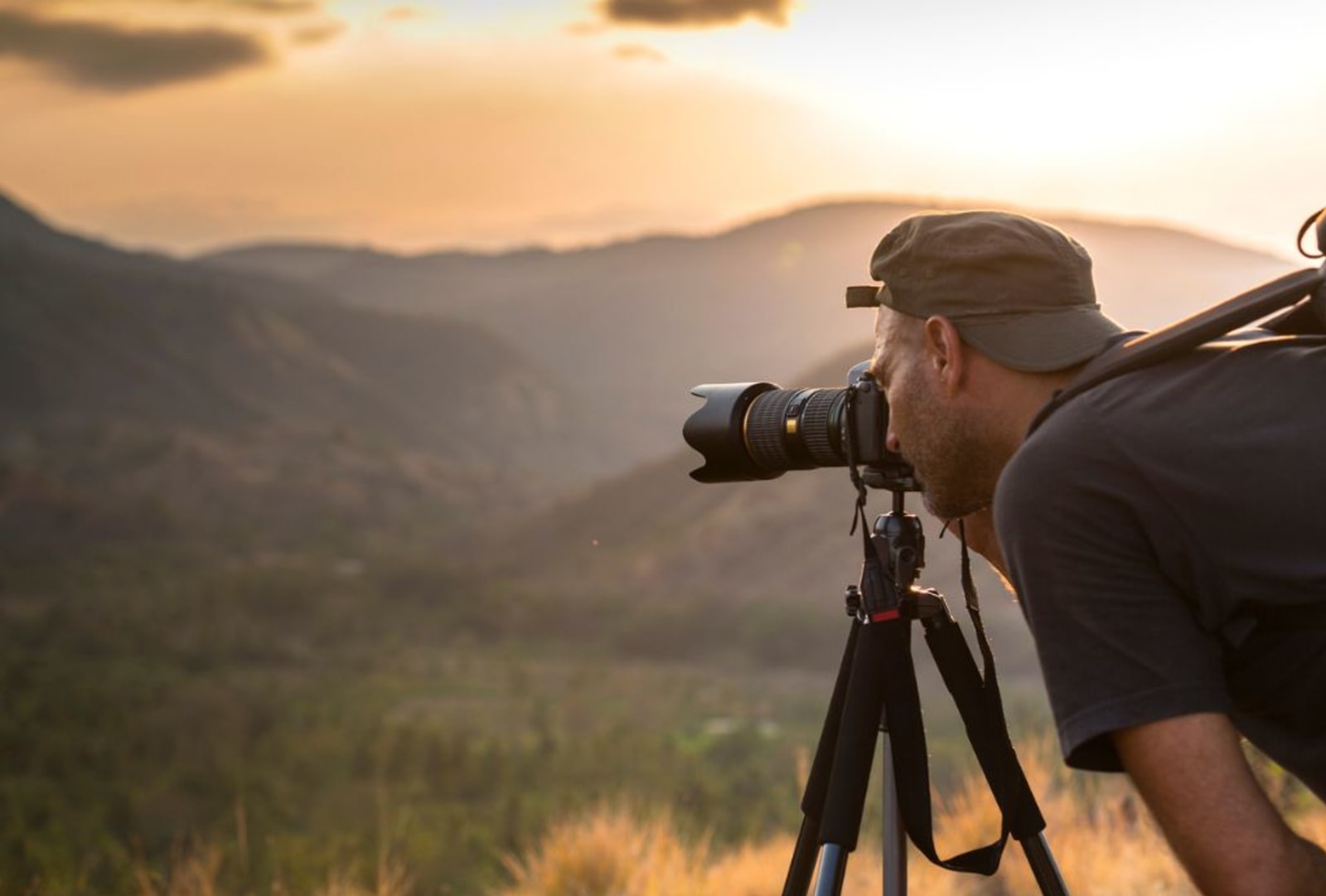 Person using a tripod to take photos