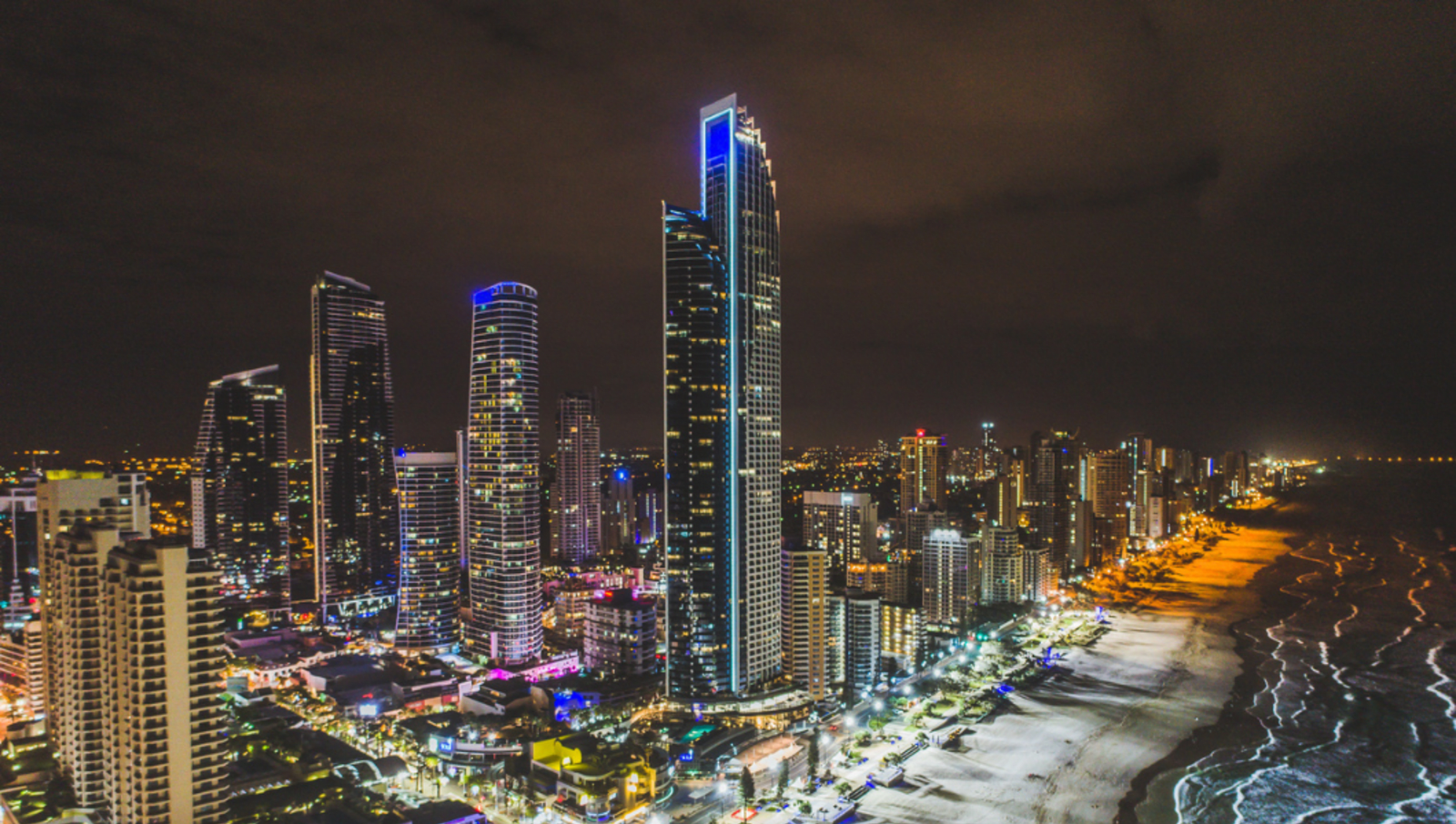 View of gold coast buildings and beach at night