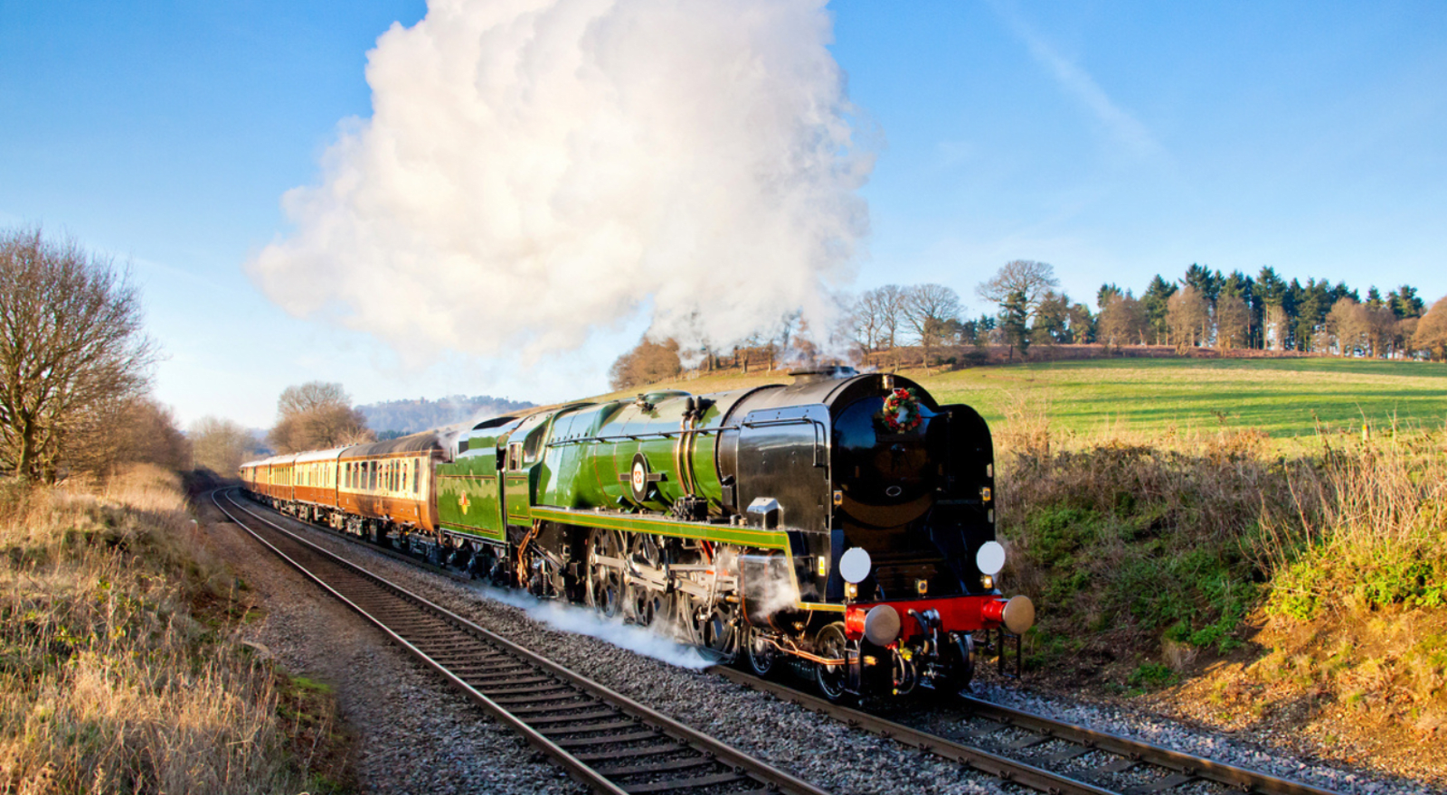 train running through countryside