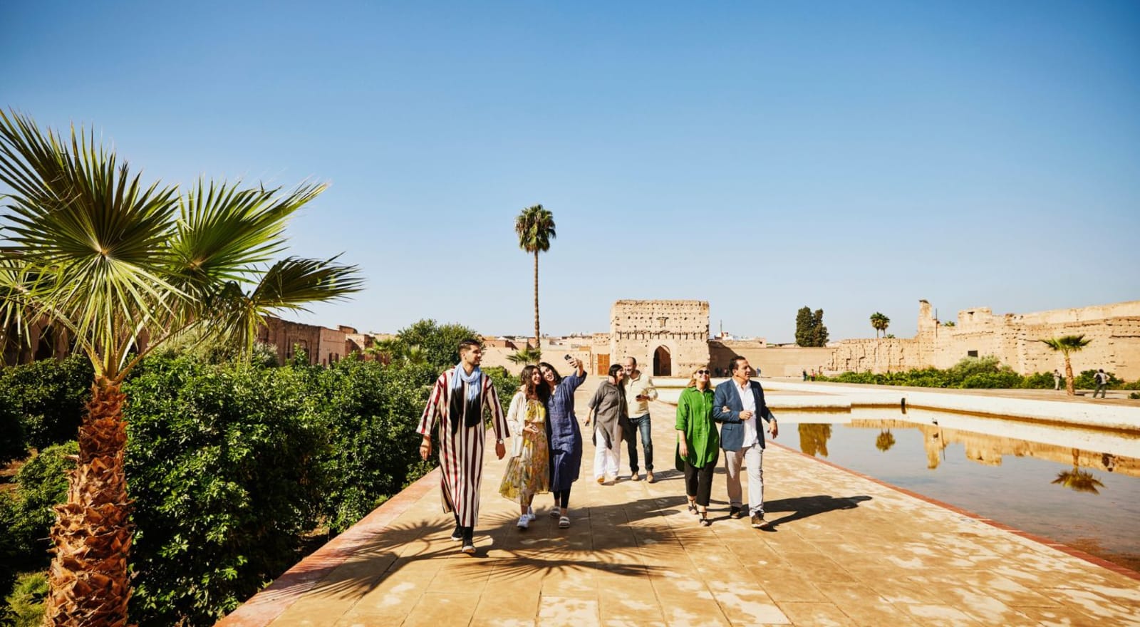 group of tourists walking through morocco