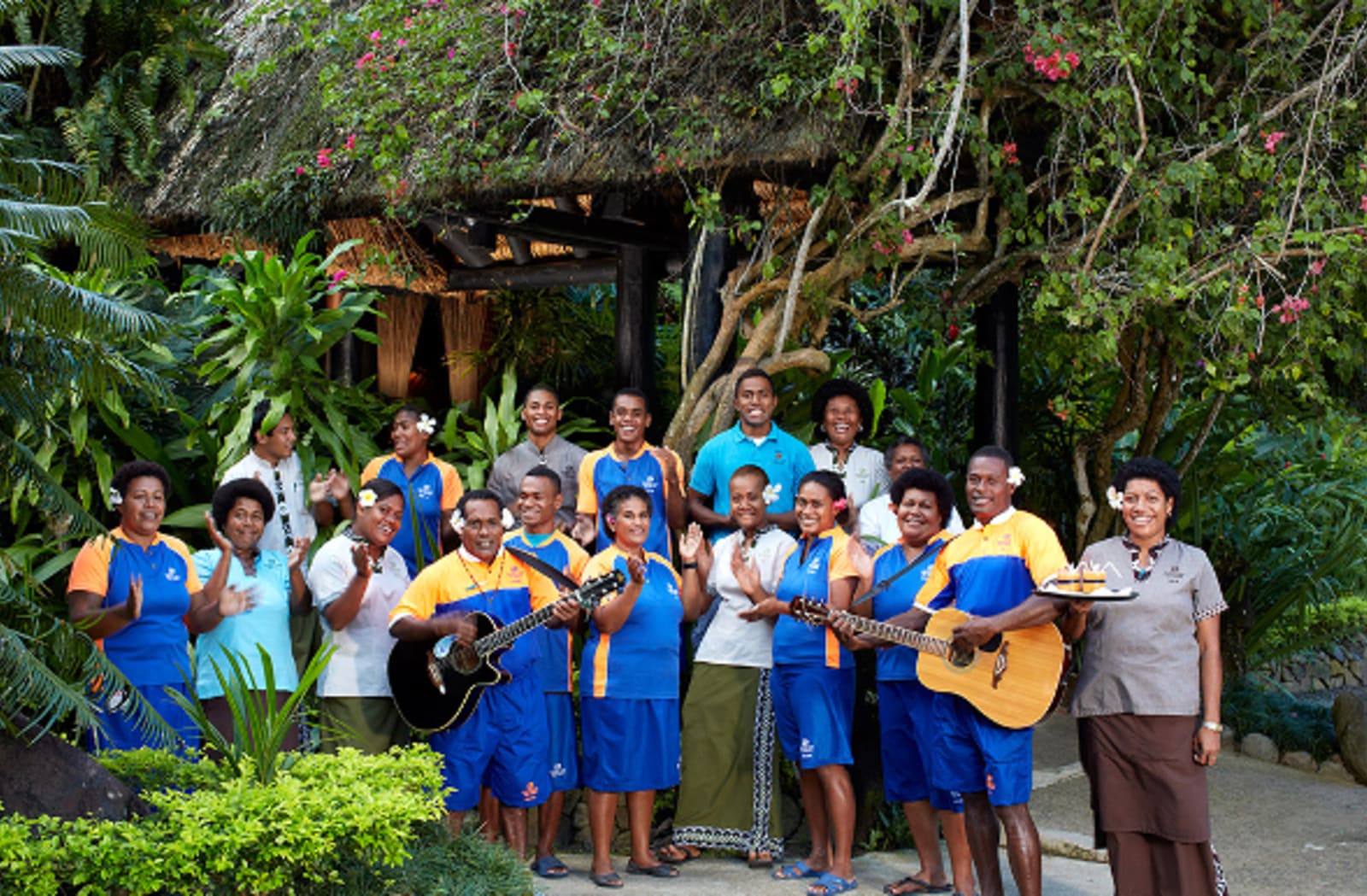  Fiji locals greeting for tourists with drinks and music