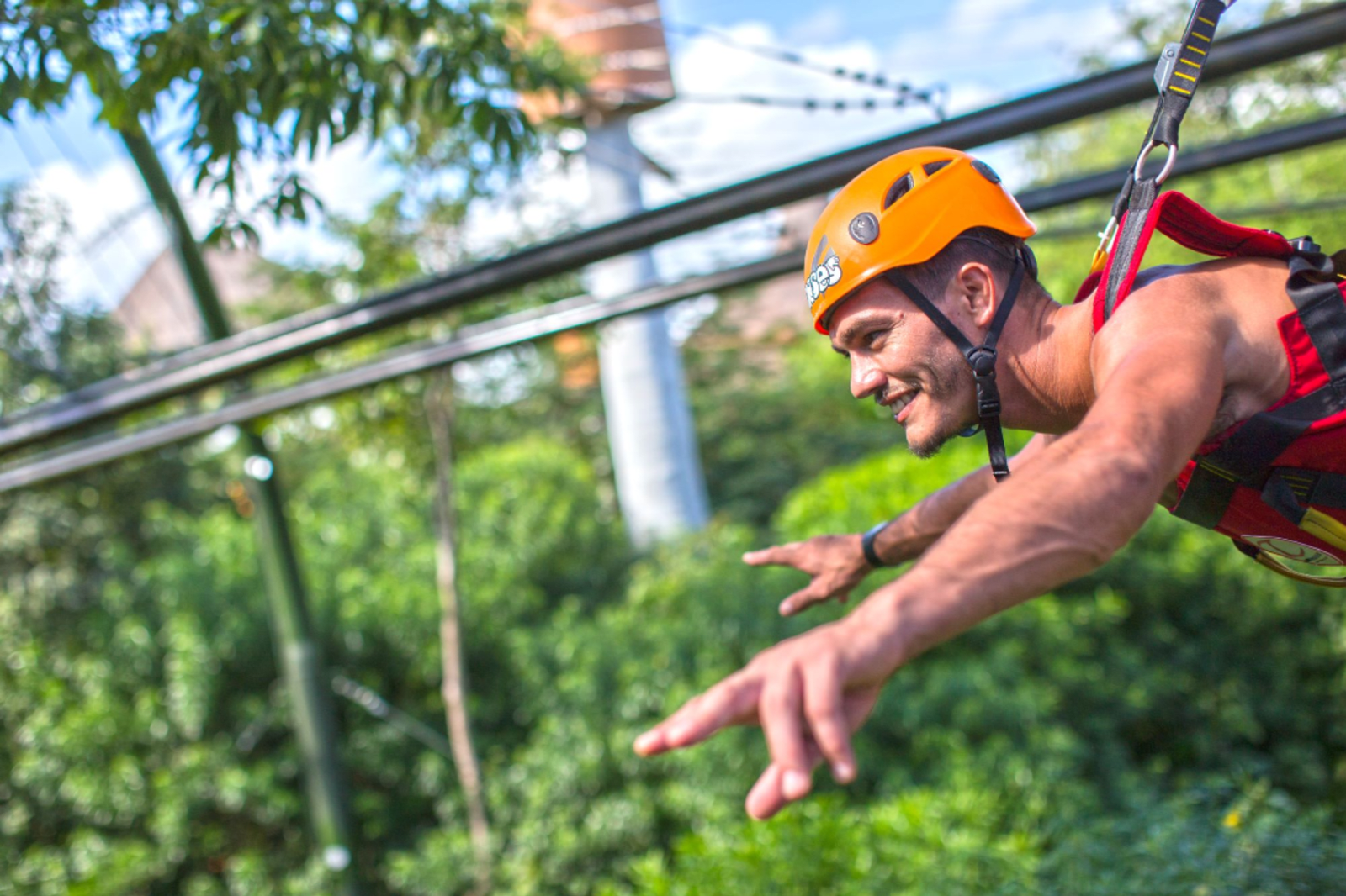 A person ziplining at a natural theme park in Mexico