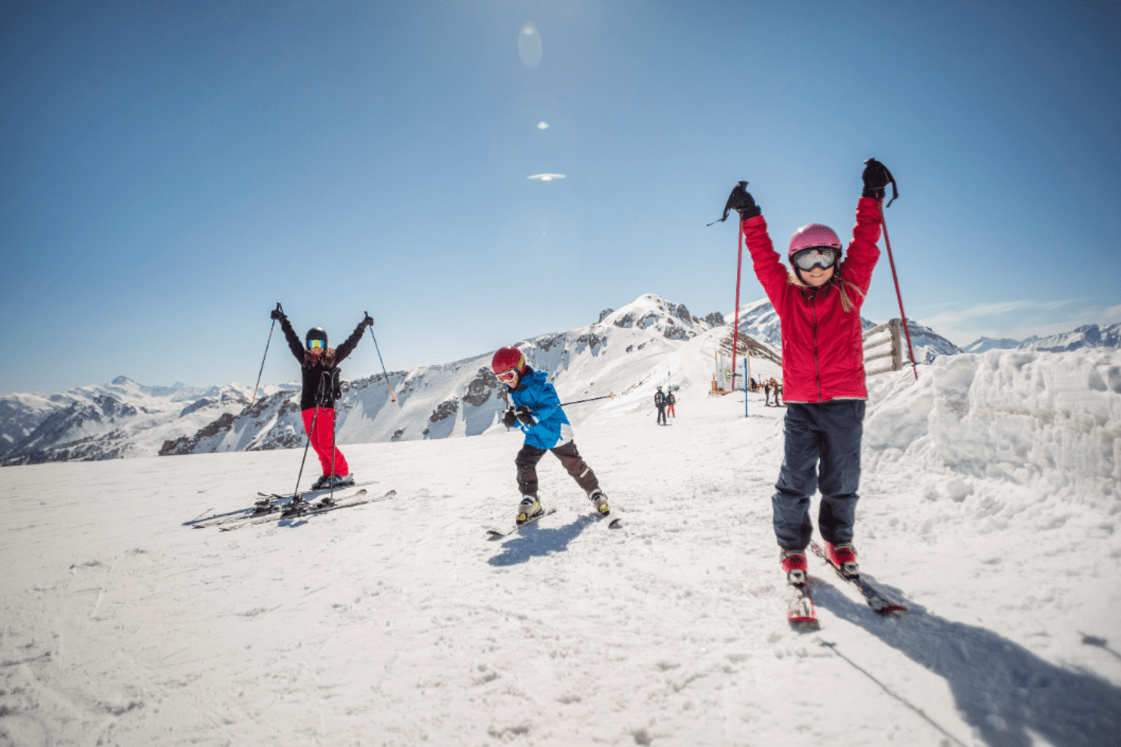A family skiing during a winter vacation