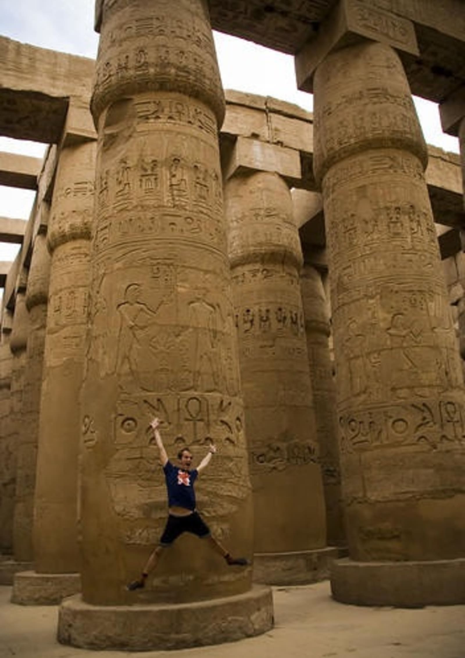 Man jumping up at the Valley of the Kings.