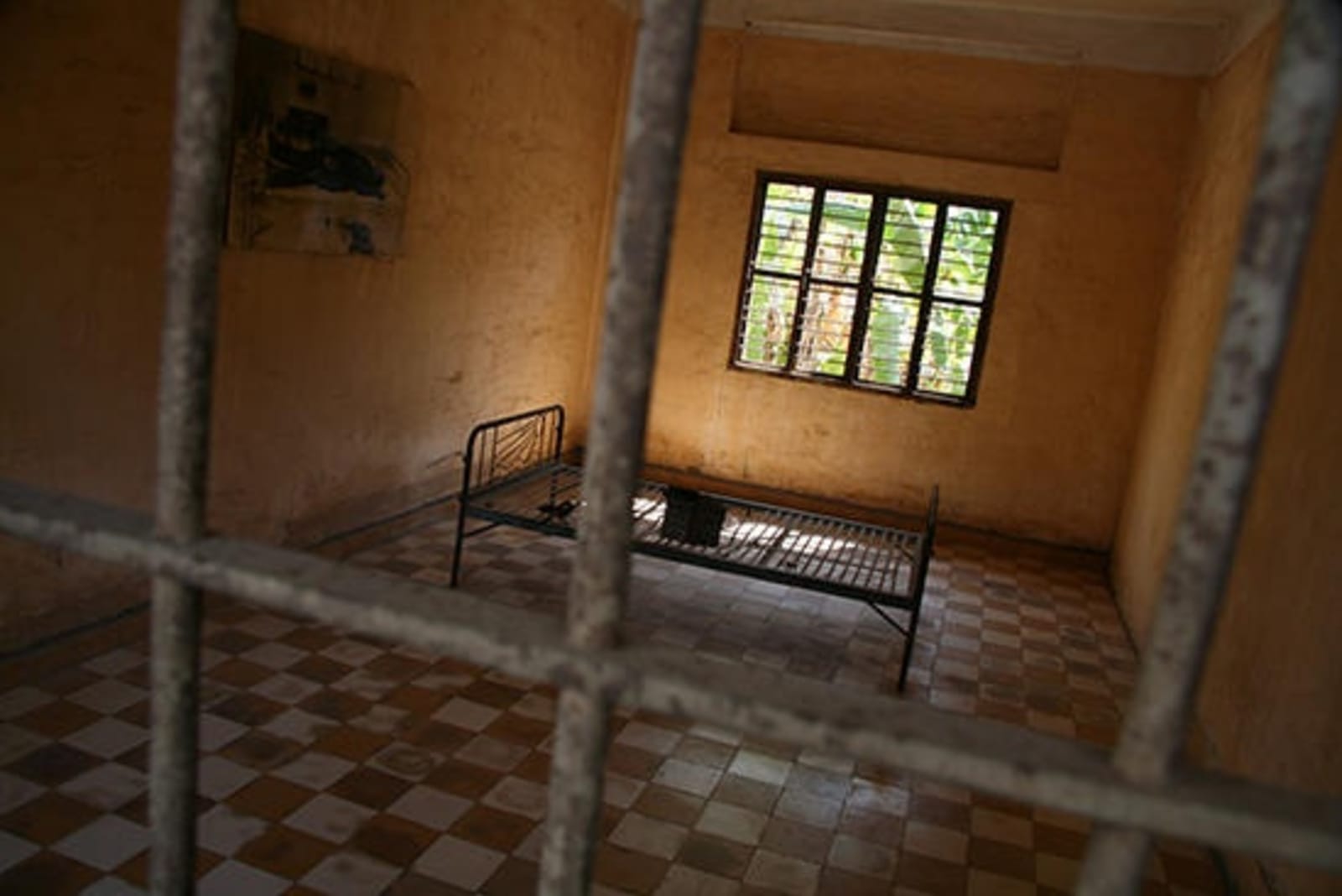 Cell in Tuol Sleng Museum.