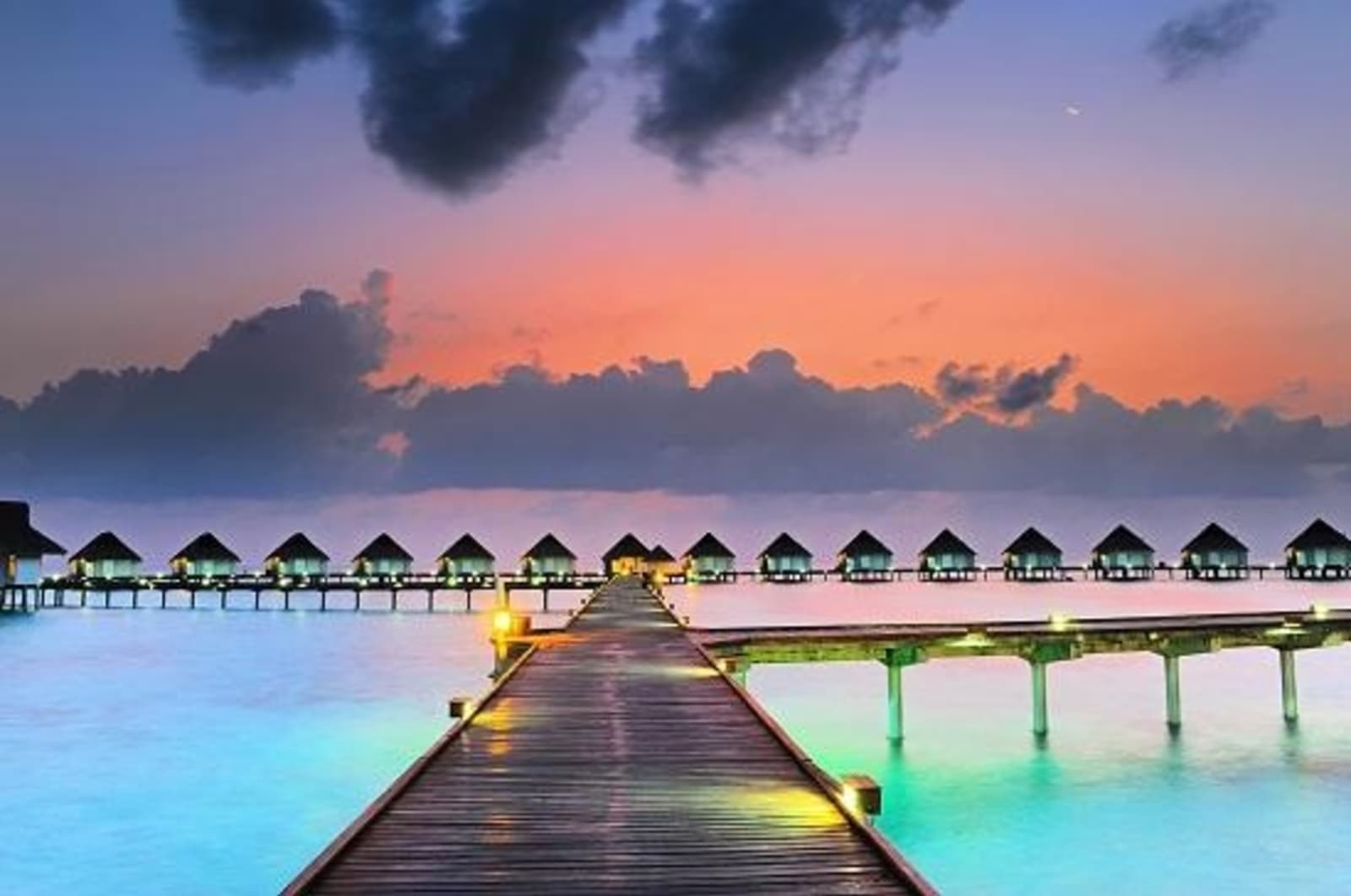Resort in the Maldives at sunset.