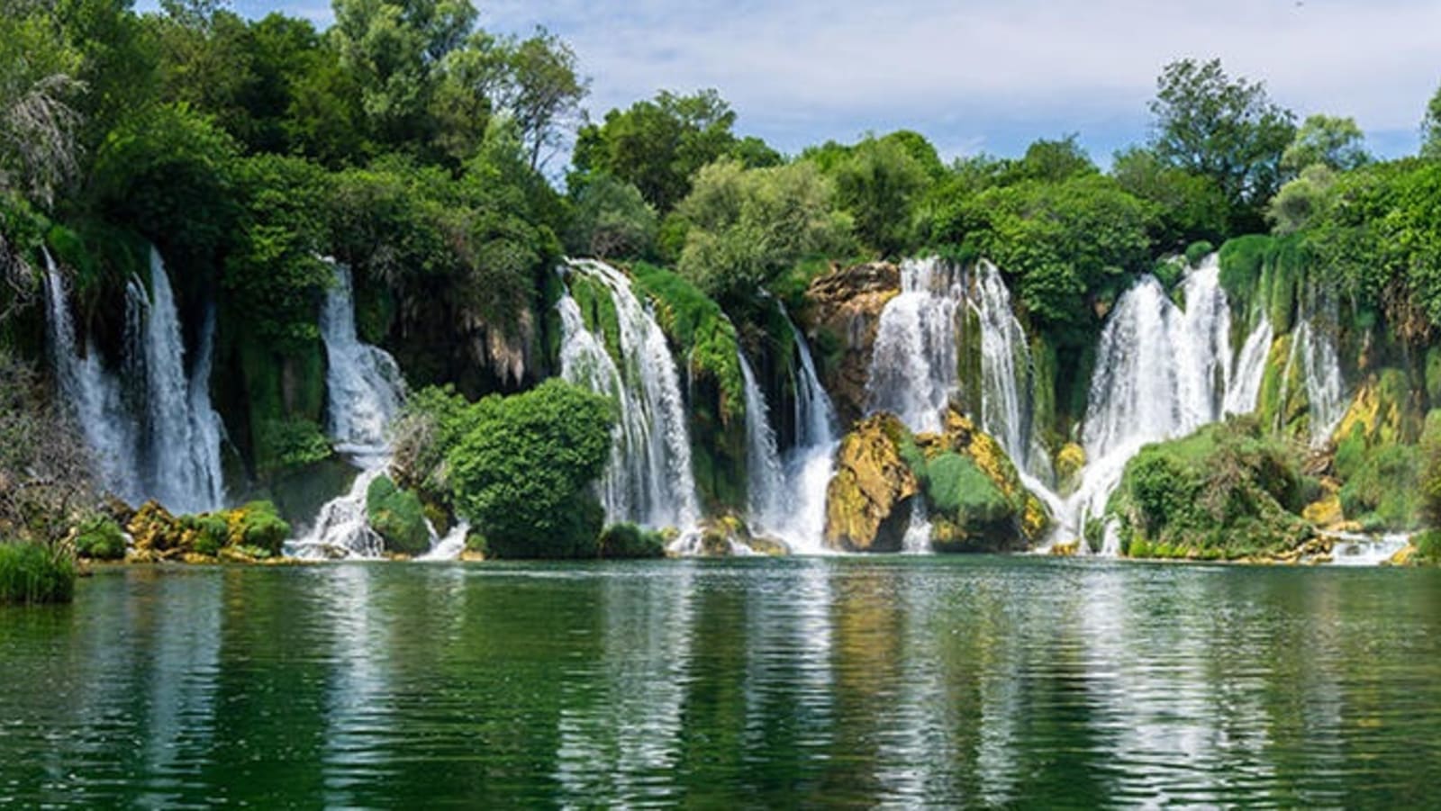 rs-kravica-waterfalls-bosnia-herzegovina-shutterstock_704552587.jpeg