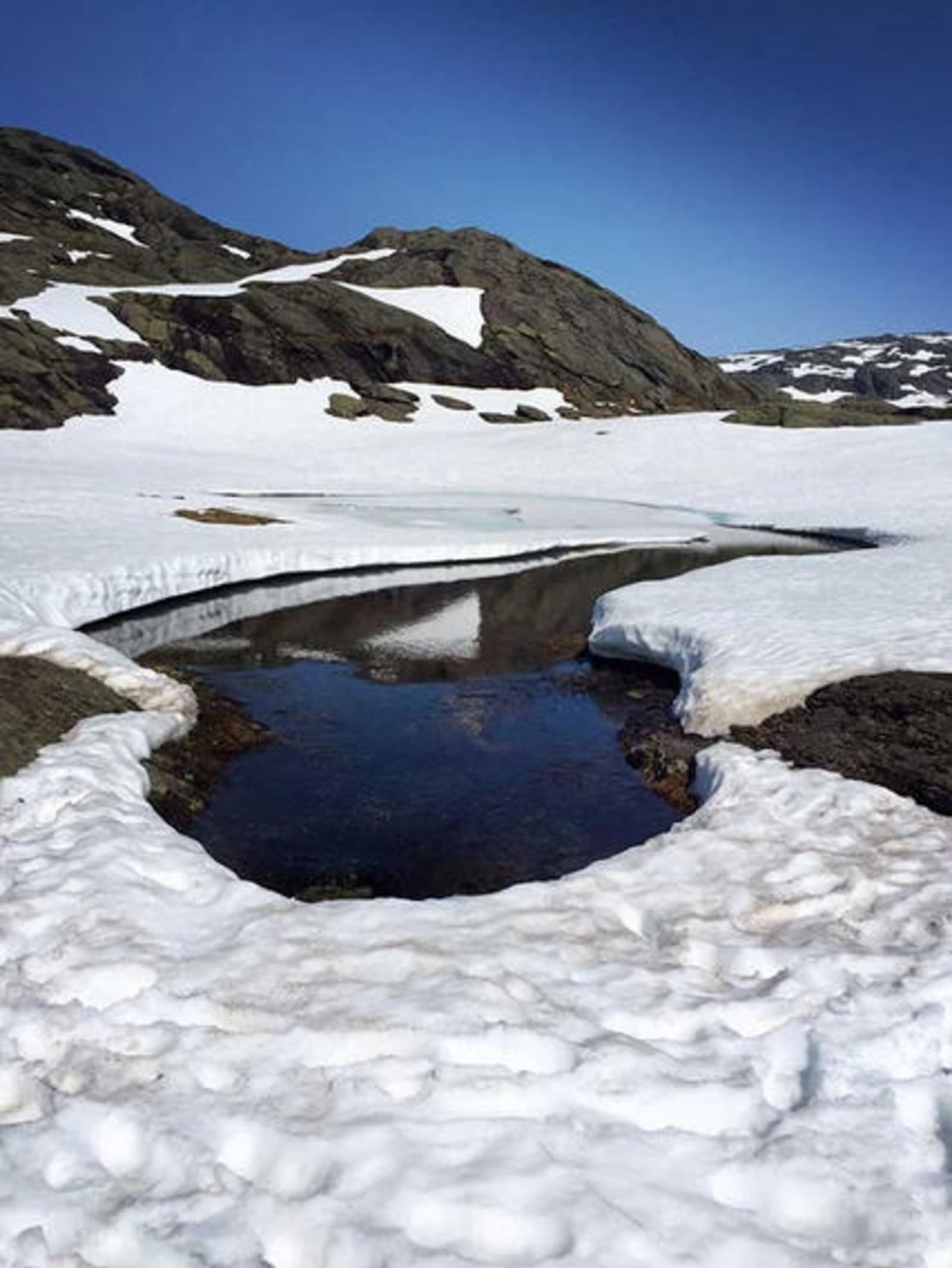 trolltunga-lake-and-snow.jpg