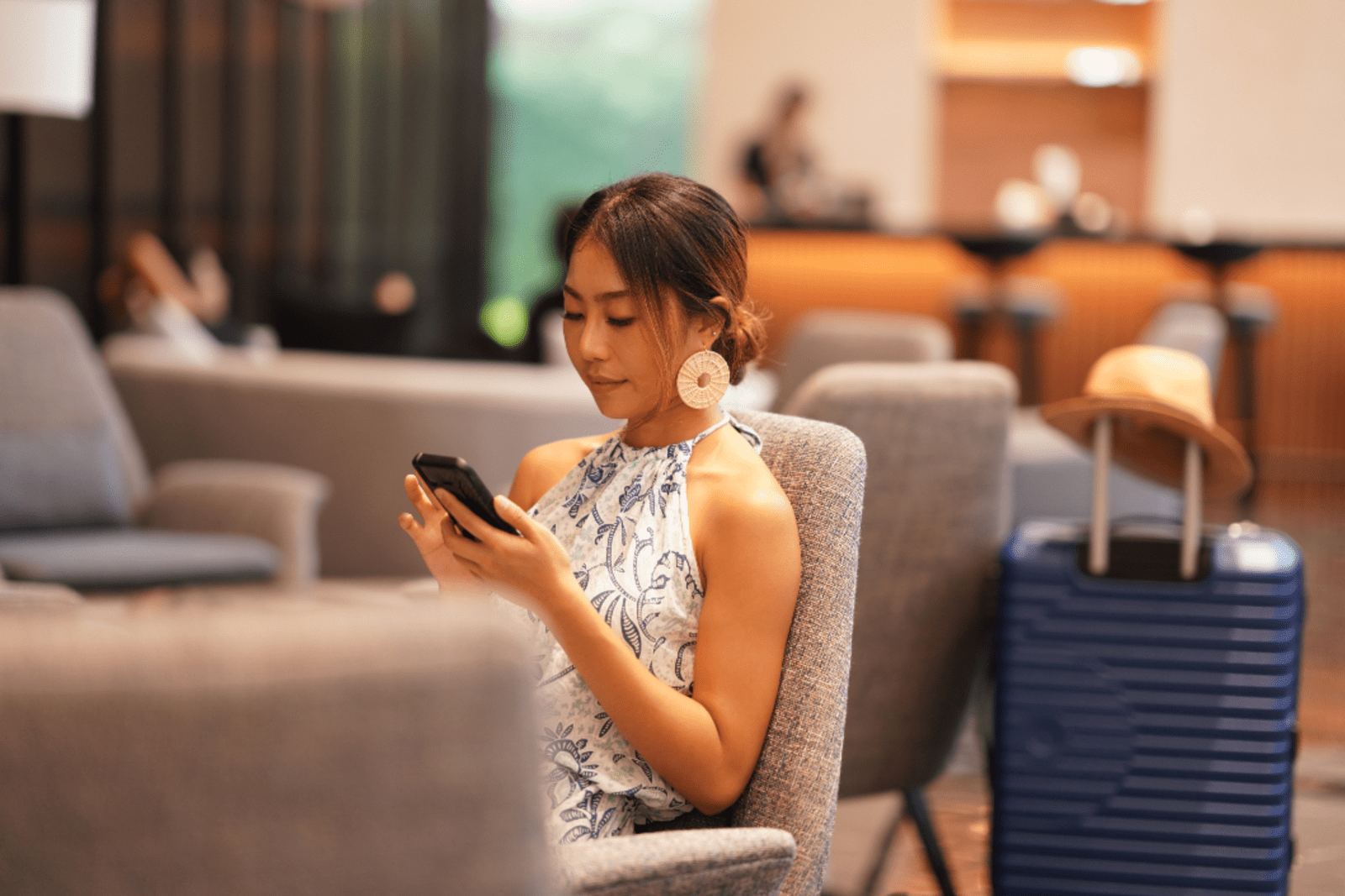 Woman relaxing in an airport lounge