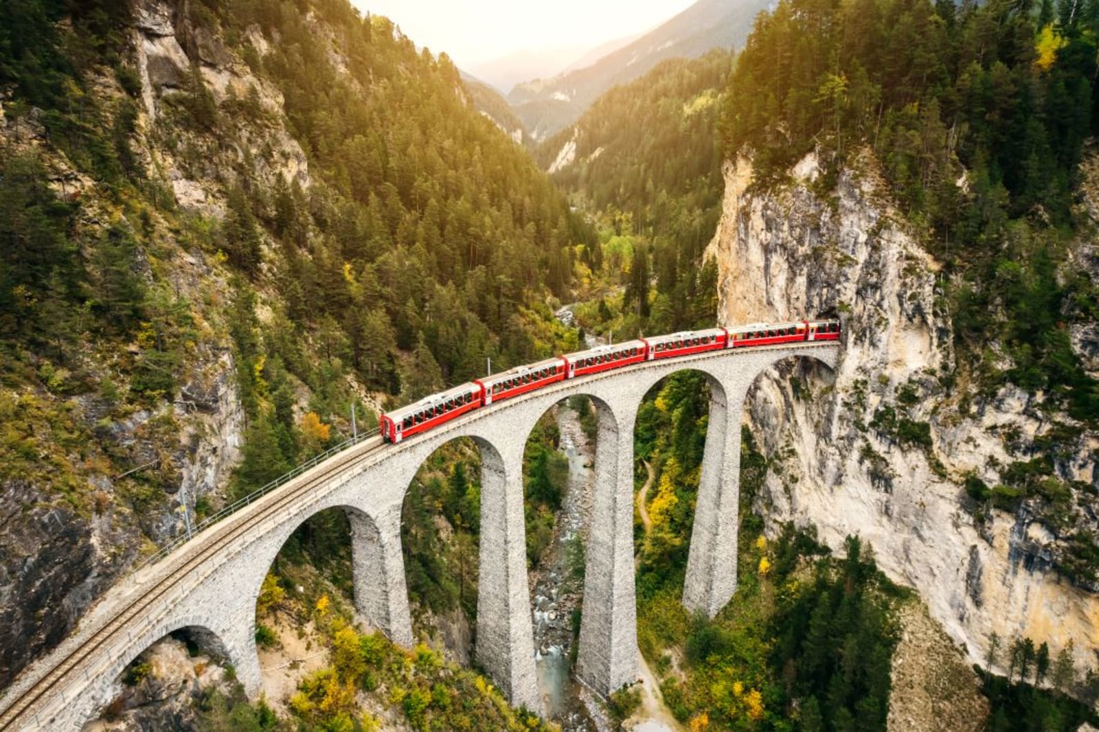 A train travelling along the Landwasser Viaduct in Switzerland