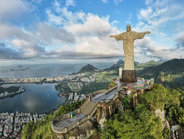 Panorama of Christ the Redeemer and further down is the city of Rio de Janeiro