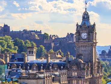 Mountain view of the city of Edinburgh with clock tower as focal point